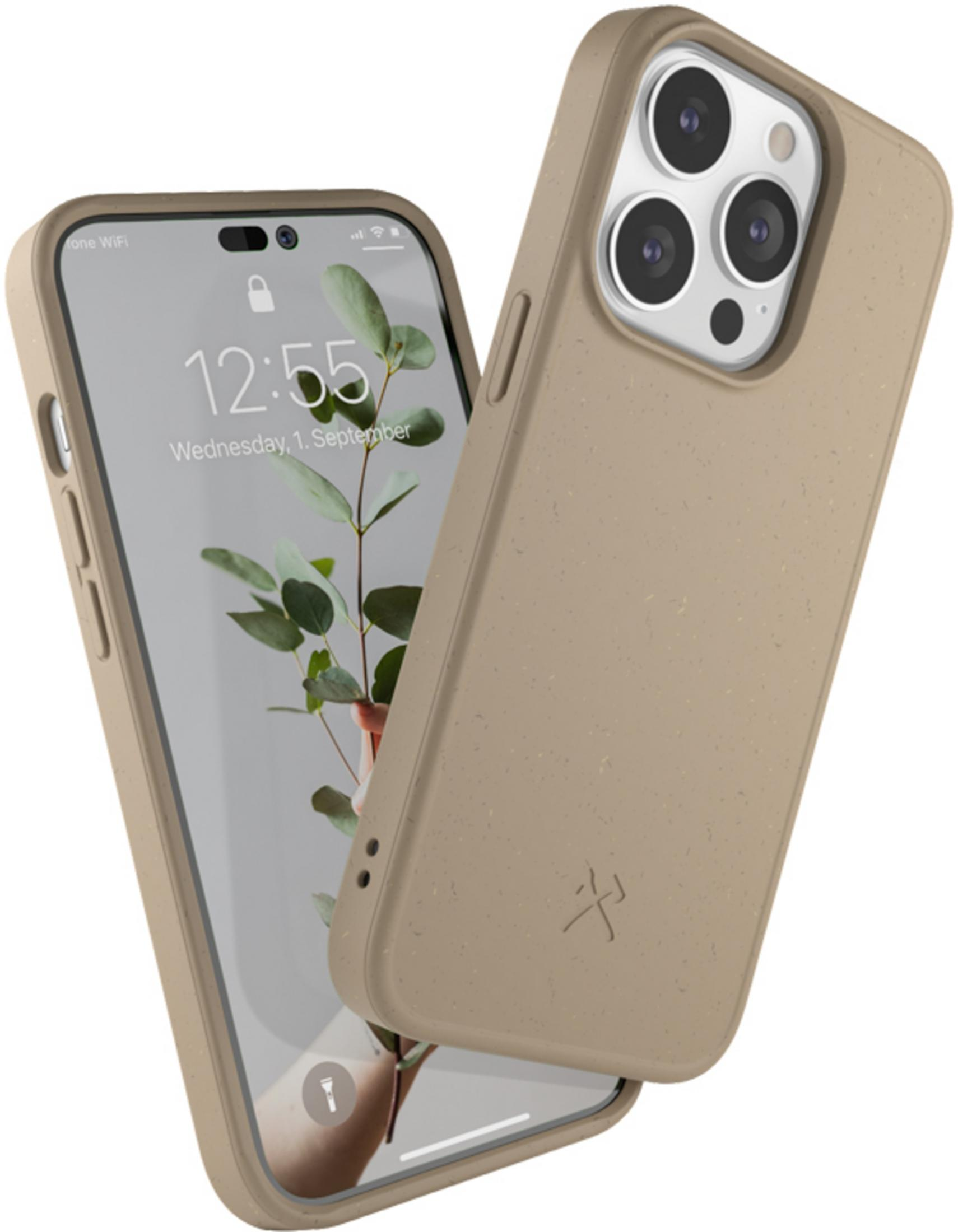 Una custodia beige accanto a un iPhone con sfondo di piante.