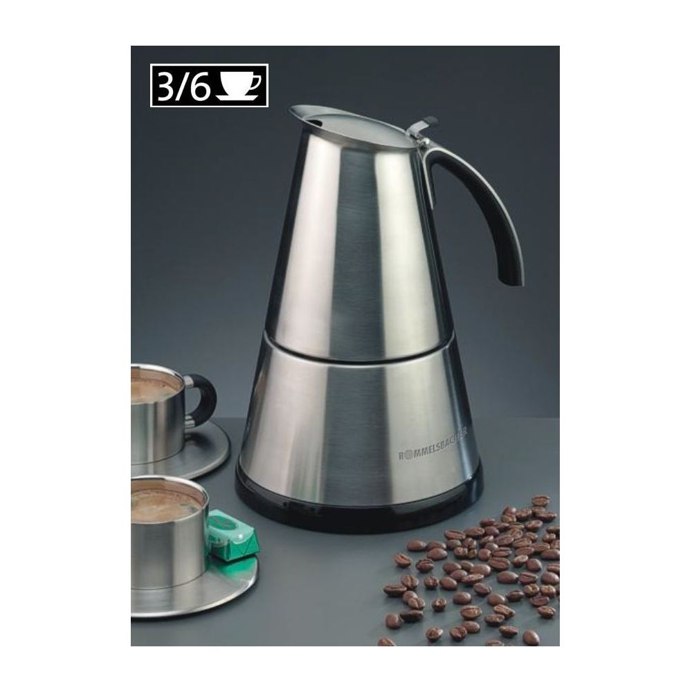 Edelstahl-Kaffeemaschine mit zwei Tassen und Kaffeebohnen.