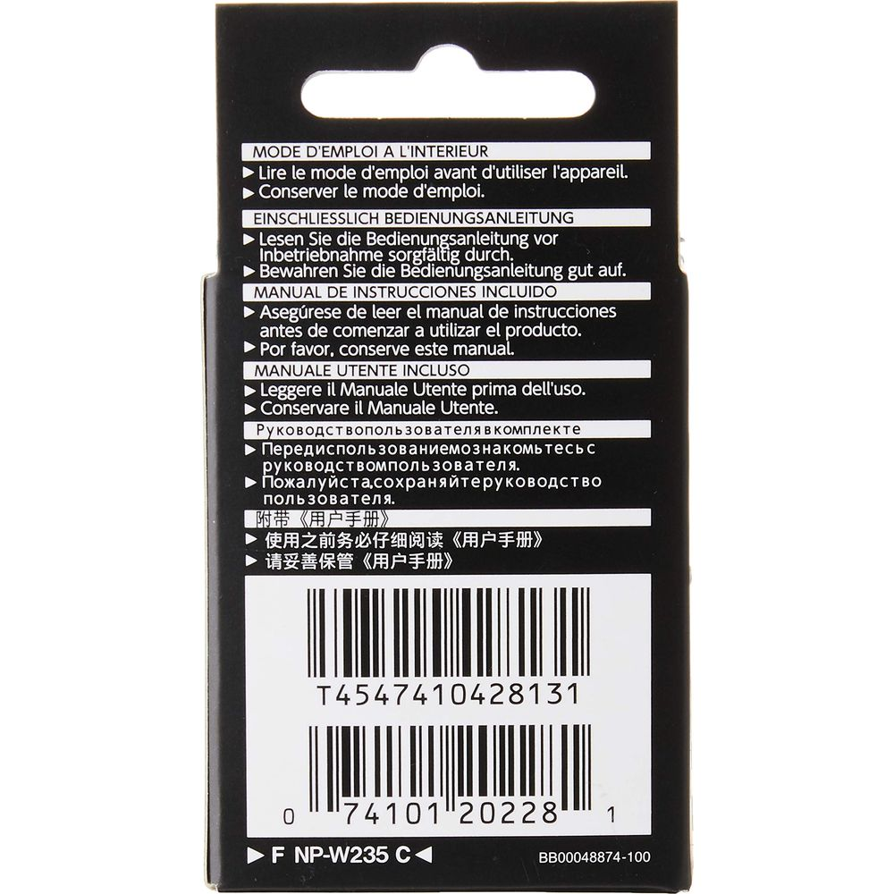 Manuale di istruzioni e codice a barre su cartoncino nero.