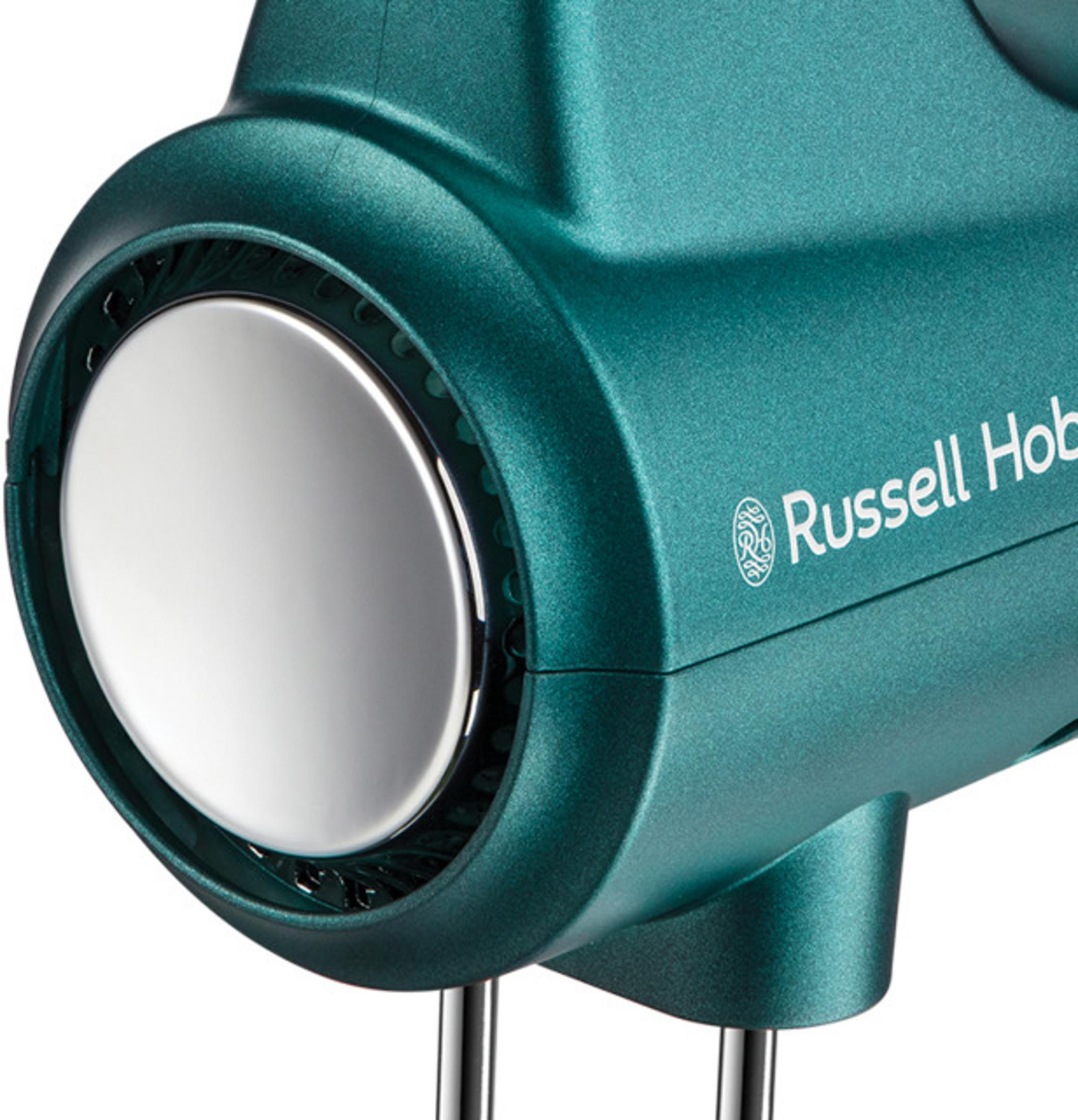 A close-up of a teal Russell Hobbs hand mixer, showing the silver-toned beaters' attachment point and branding.