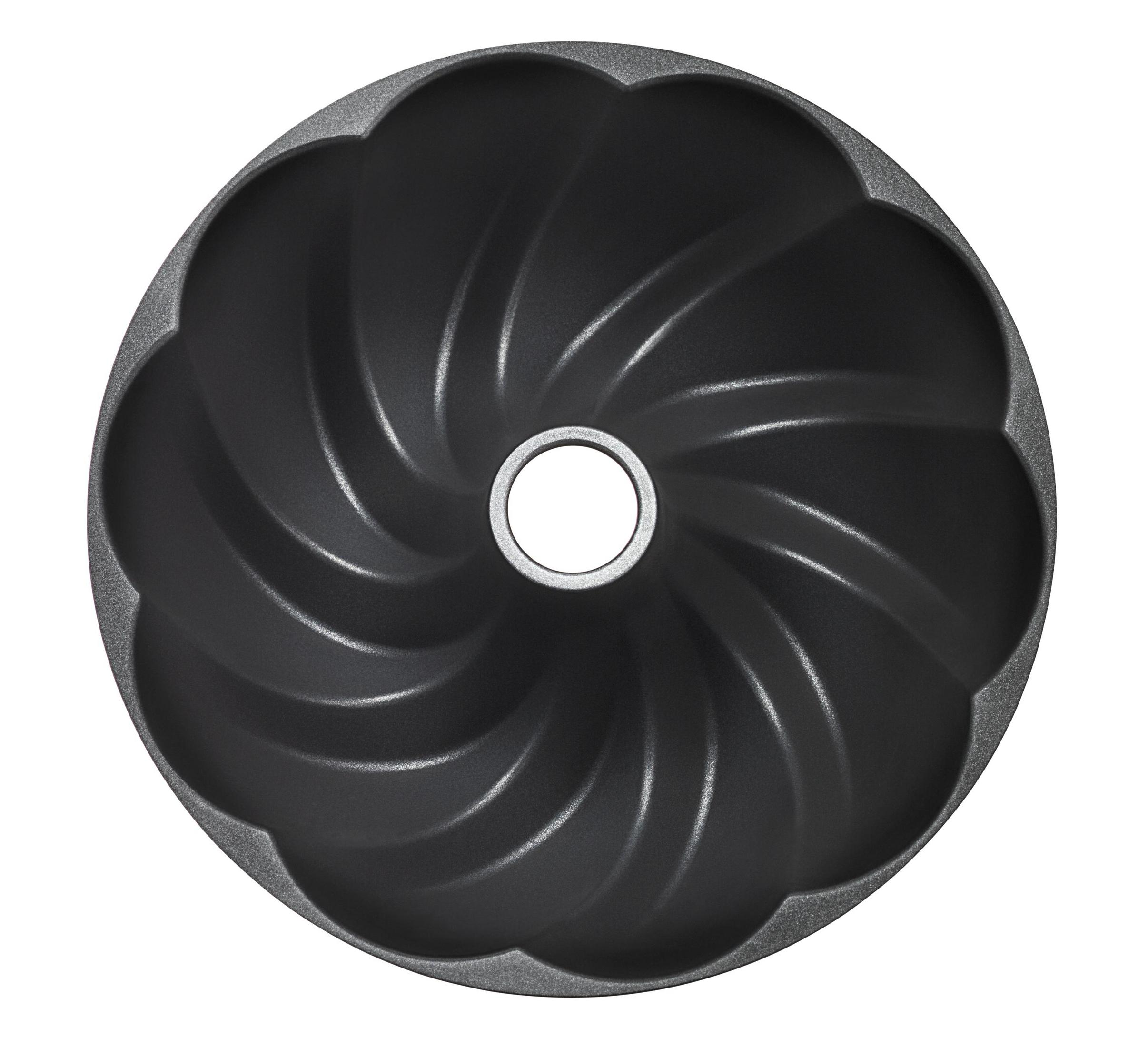 Un moule à kouglof rond et foncé avec des rainures en spirale et un trou central.