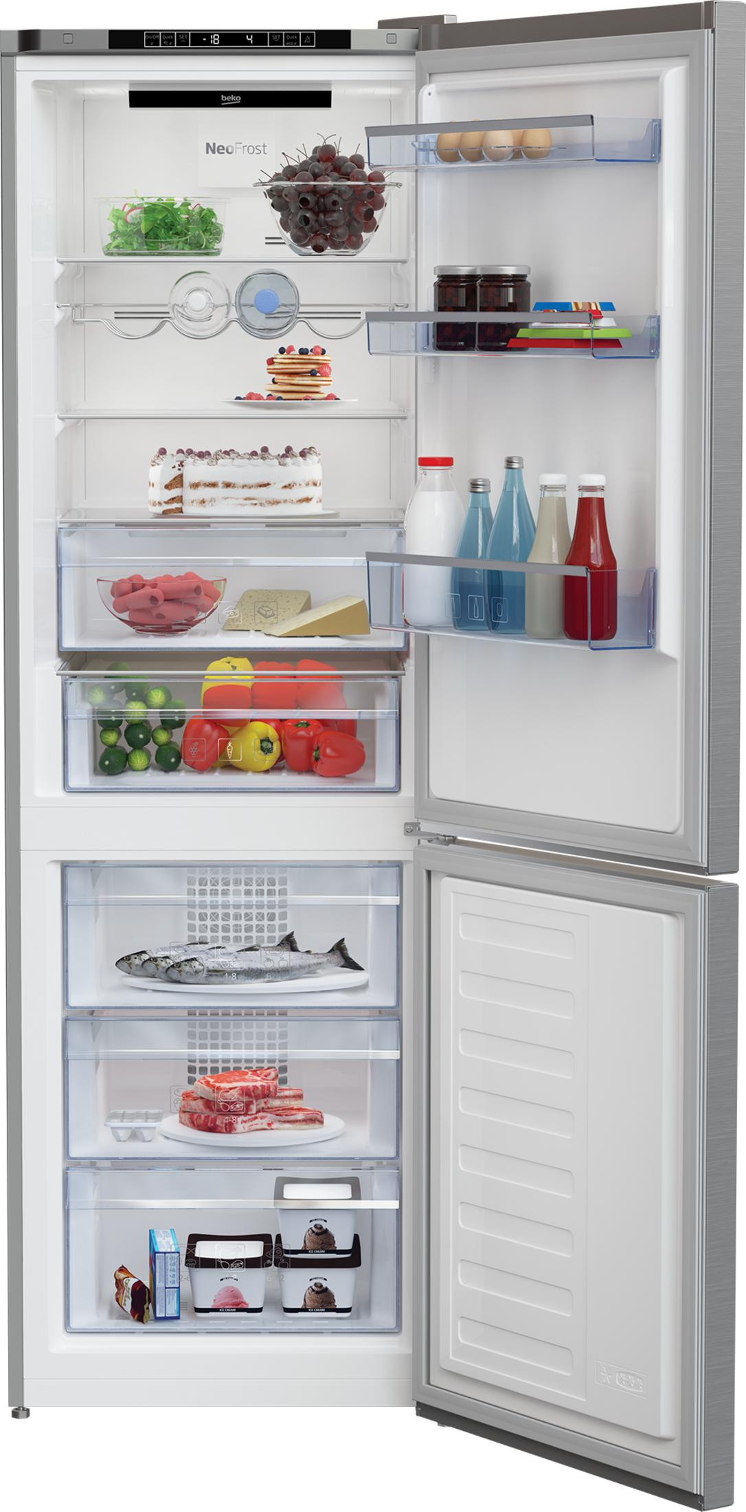 Frigorifero aperto con cibo: frutta, torta, verdura, pesce, carne, gelato.