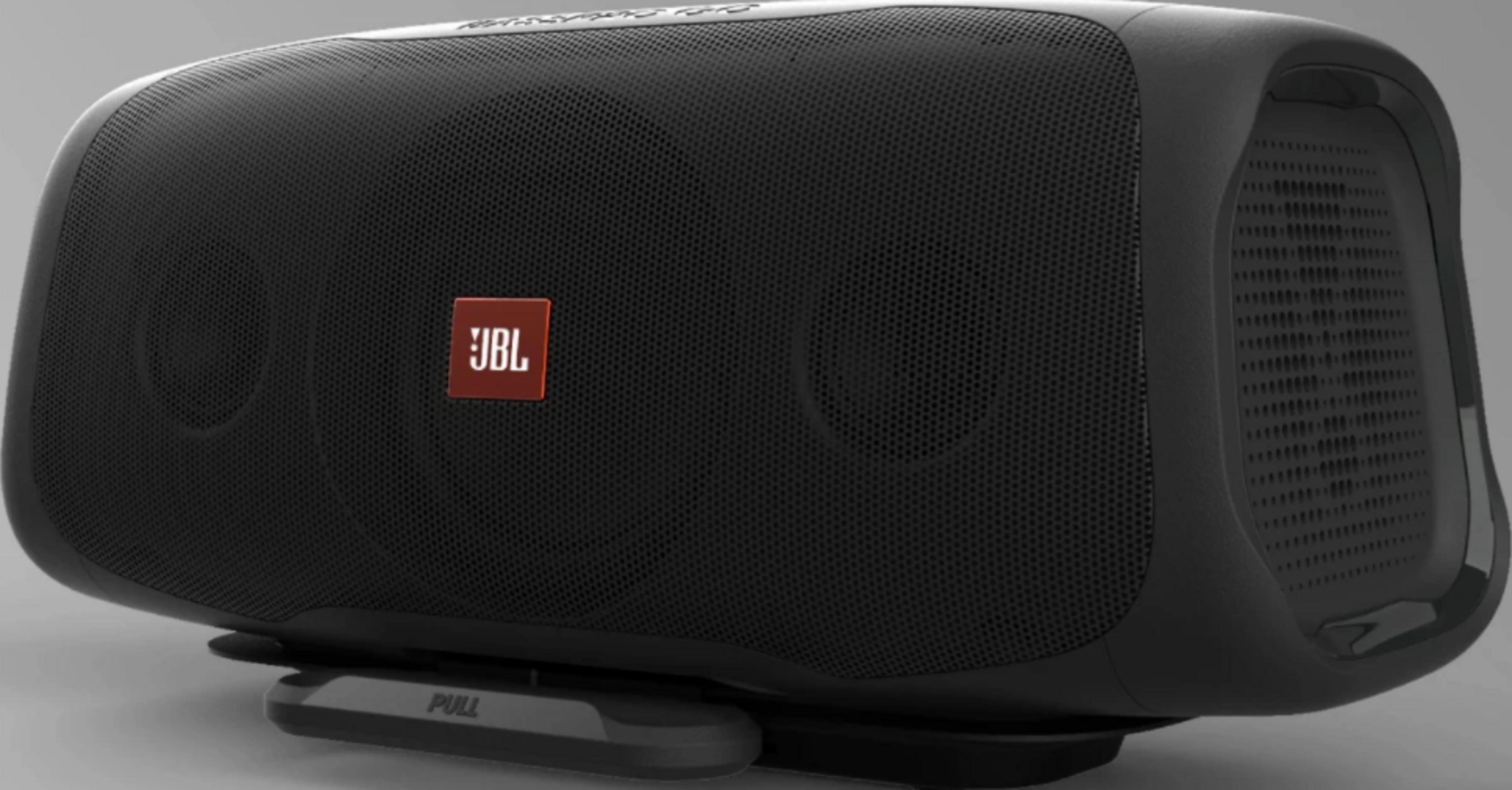 Schwarzer JBL Lautsprecher mit rotem Logo, auf grauem Untergrund.