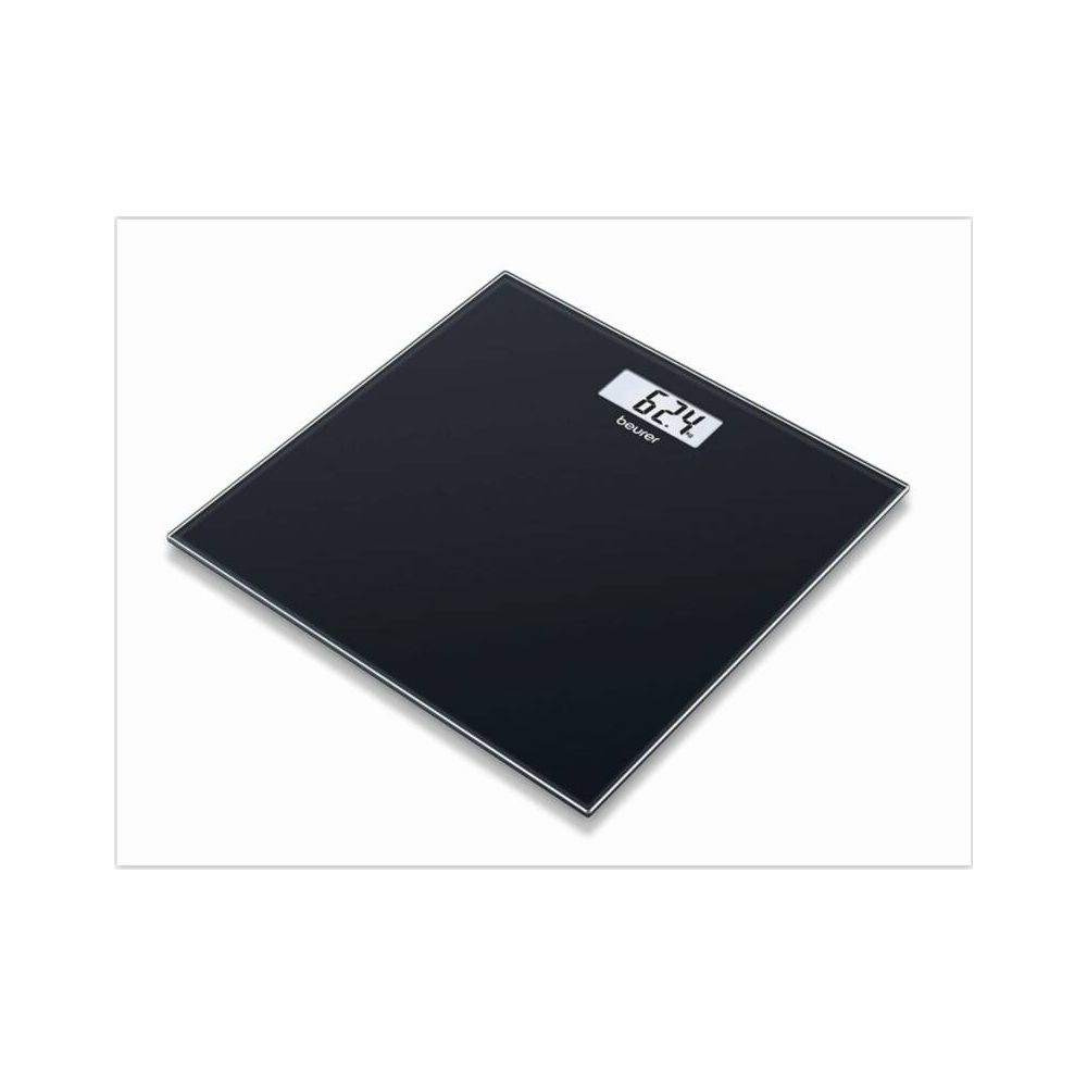 Balanza digital negra con pantalla iluminada que muestra 62.4.