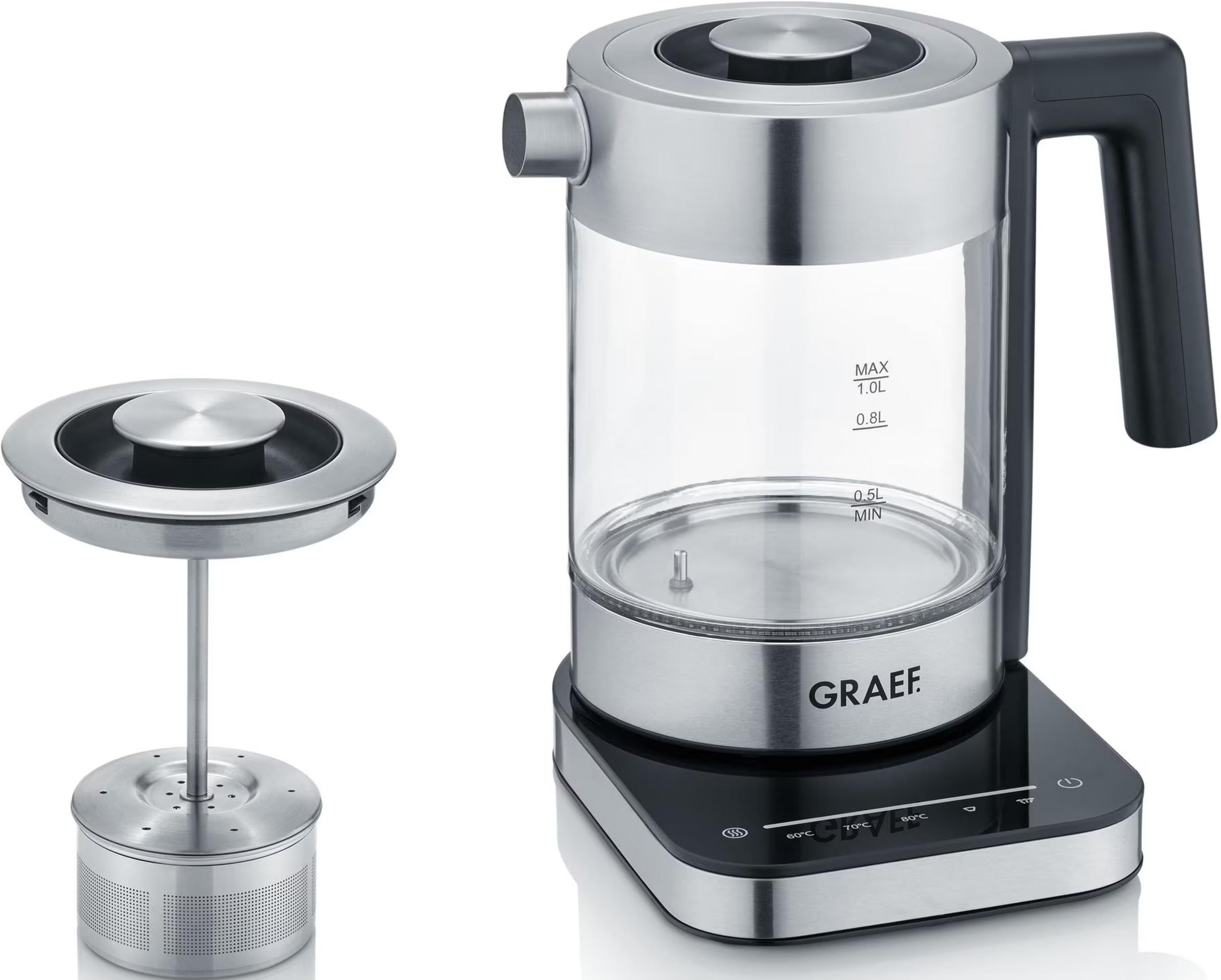 Szklany czajnik z wyborem temperatury i filtrem do herbaty na białym tle.