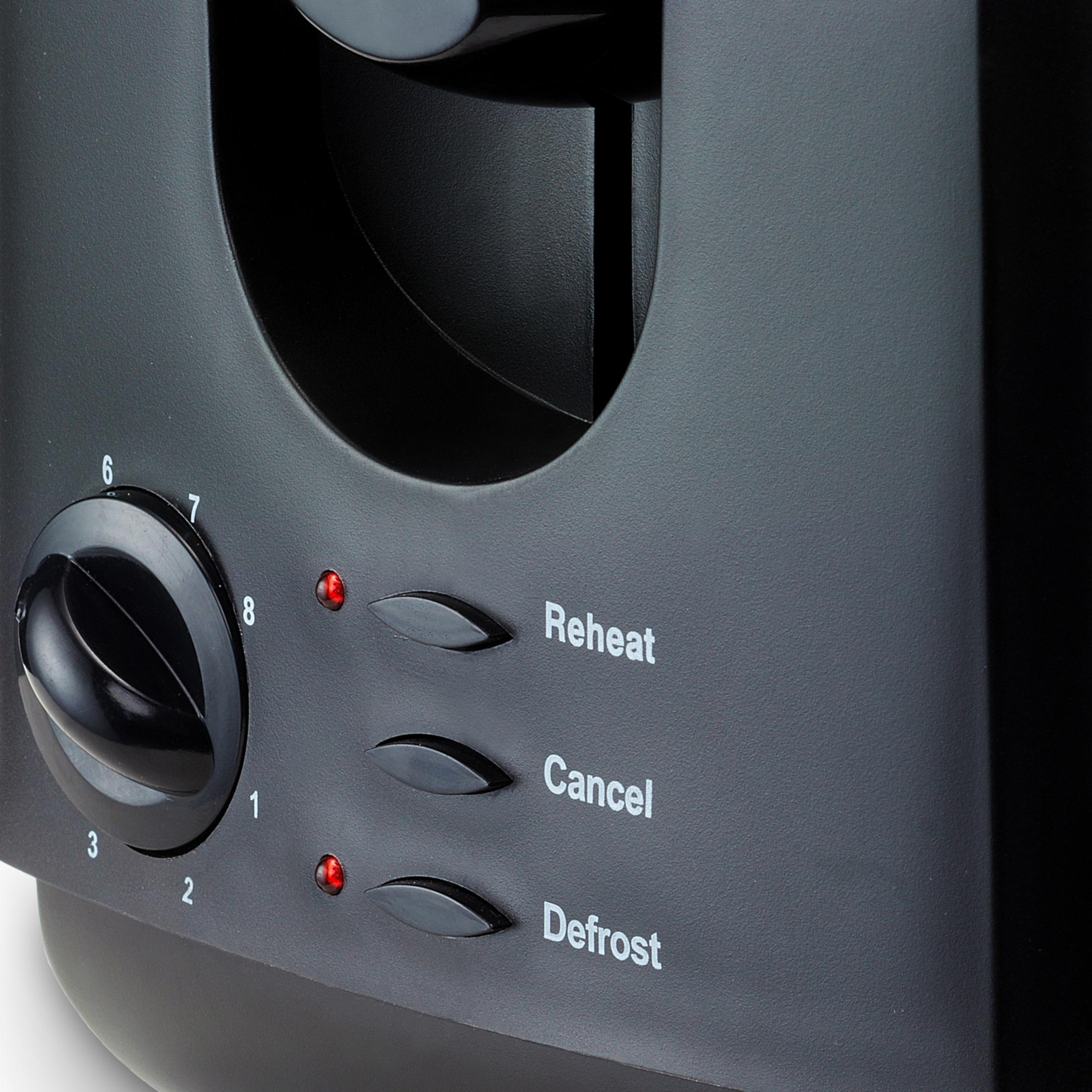Grille-pain noir avec molette et boutons pour dégivrage, réchauffage et annulation.