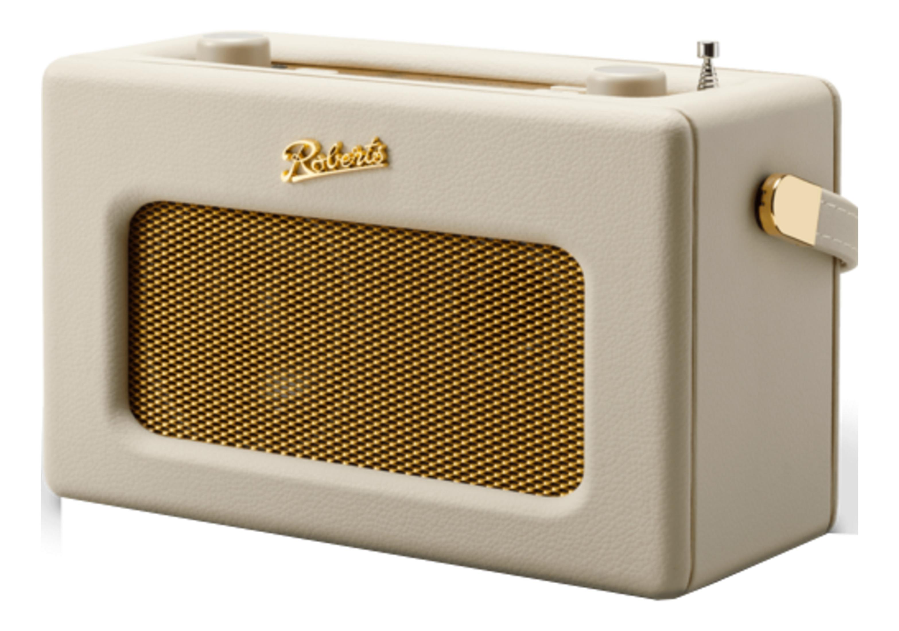 Kremowe radio przenośne ze złotą maskownicą głośnika i srebrną anteną.