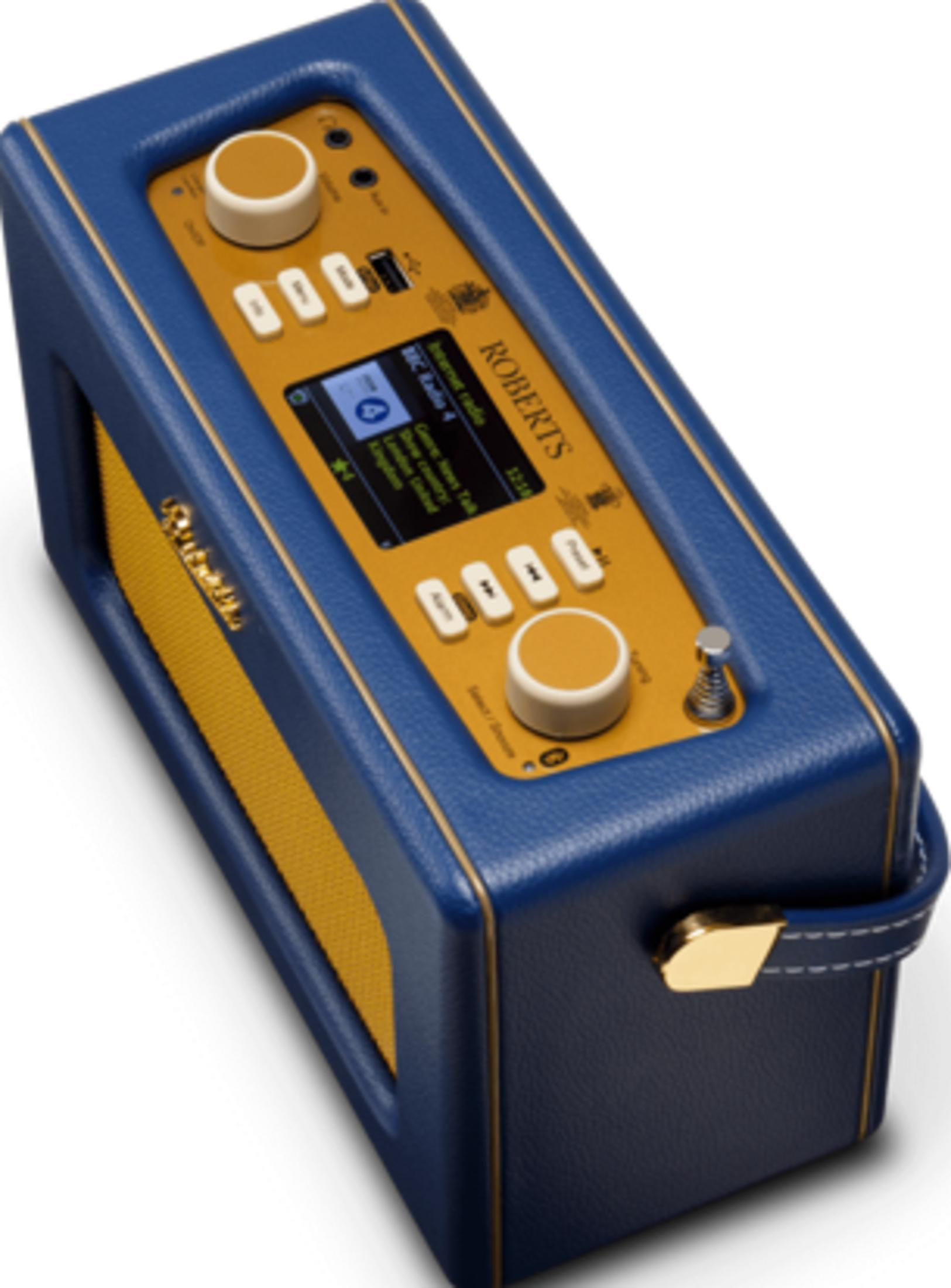 Niebiesko-złote radio z gałkami i ekranem.