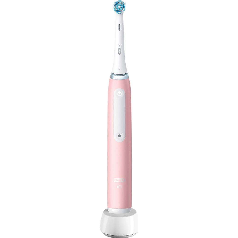Eine rosa elektrische Zahnbürste mit weißem Sockel und blauem Bürstenkopf.