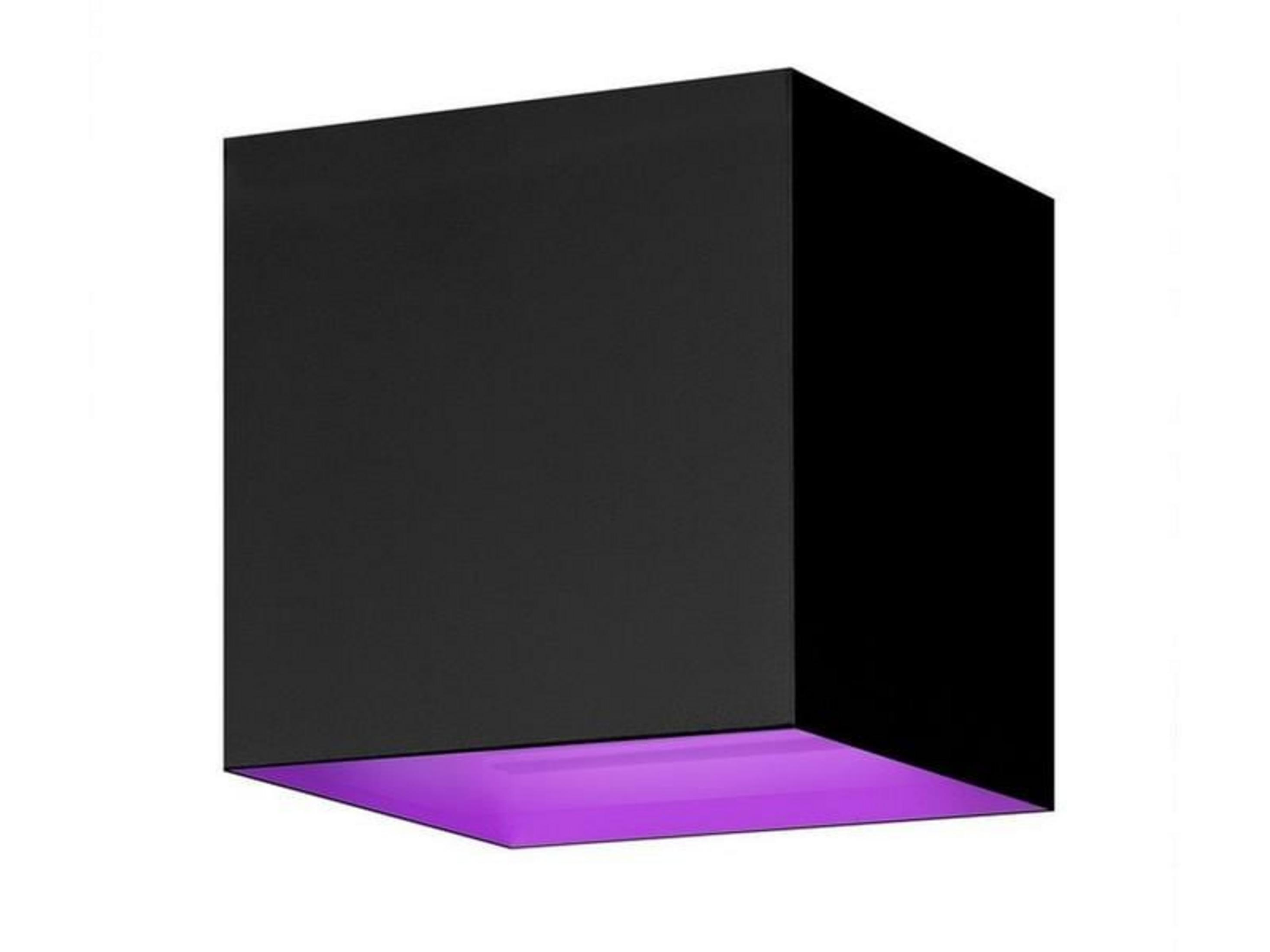 Un cube noir avec un dessous violet sur fond blanc.
