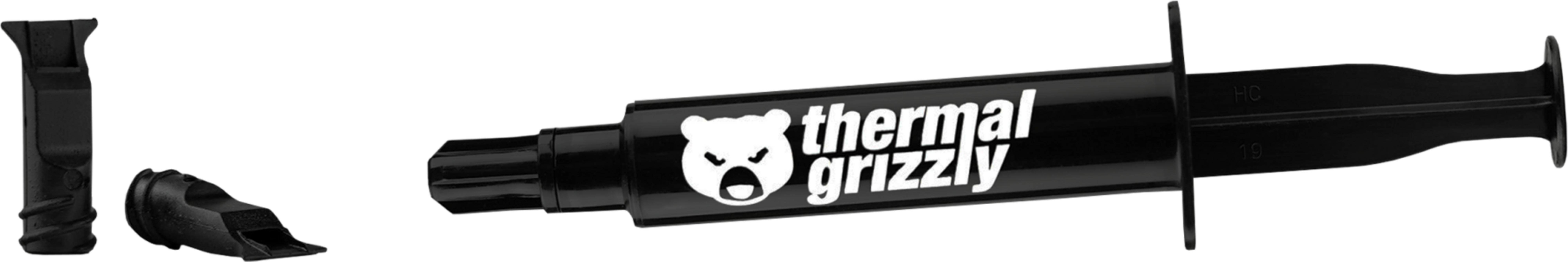 Ayı logolu ve iki ek siyah aplikatörlü siyah Thermal Grizzly şırınga.