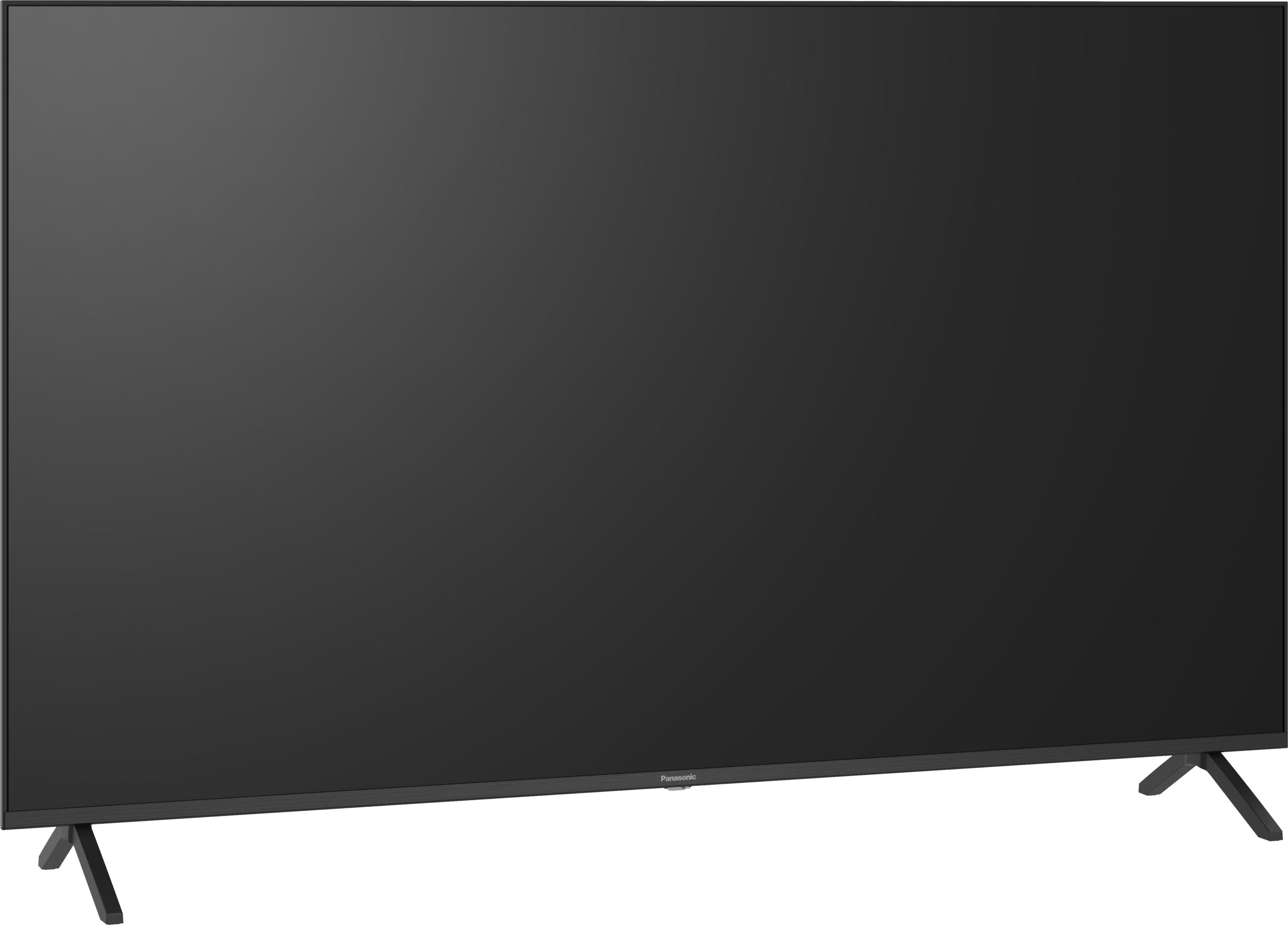 Ein schwarzer Flachbildfernseher mit silbernem Ständer auf weißem Hintergrund.