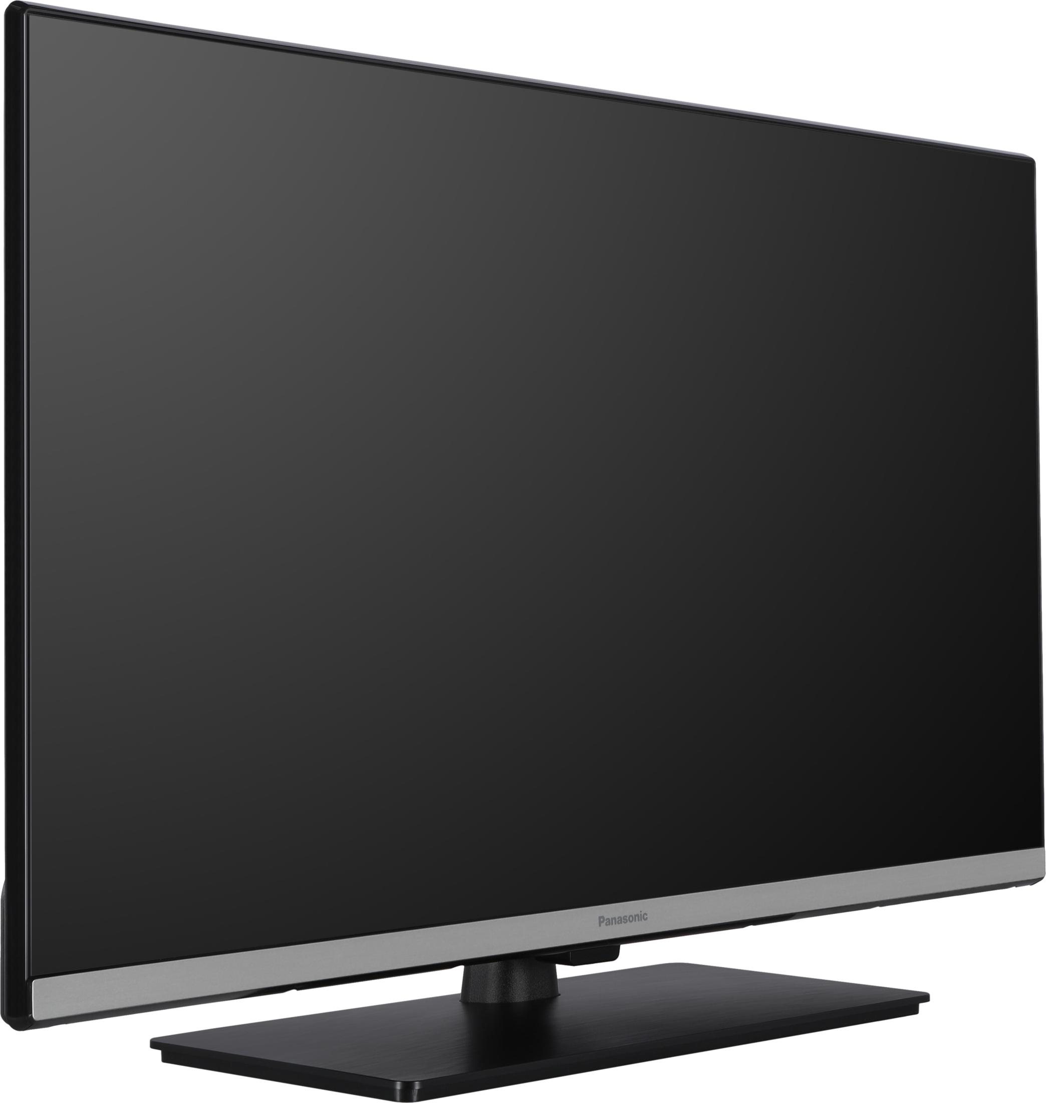 Czarny telewizor Panasonic z szerokim ekranem i srebrnym paskiem.