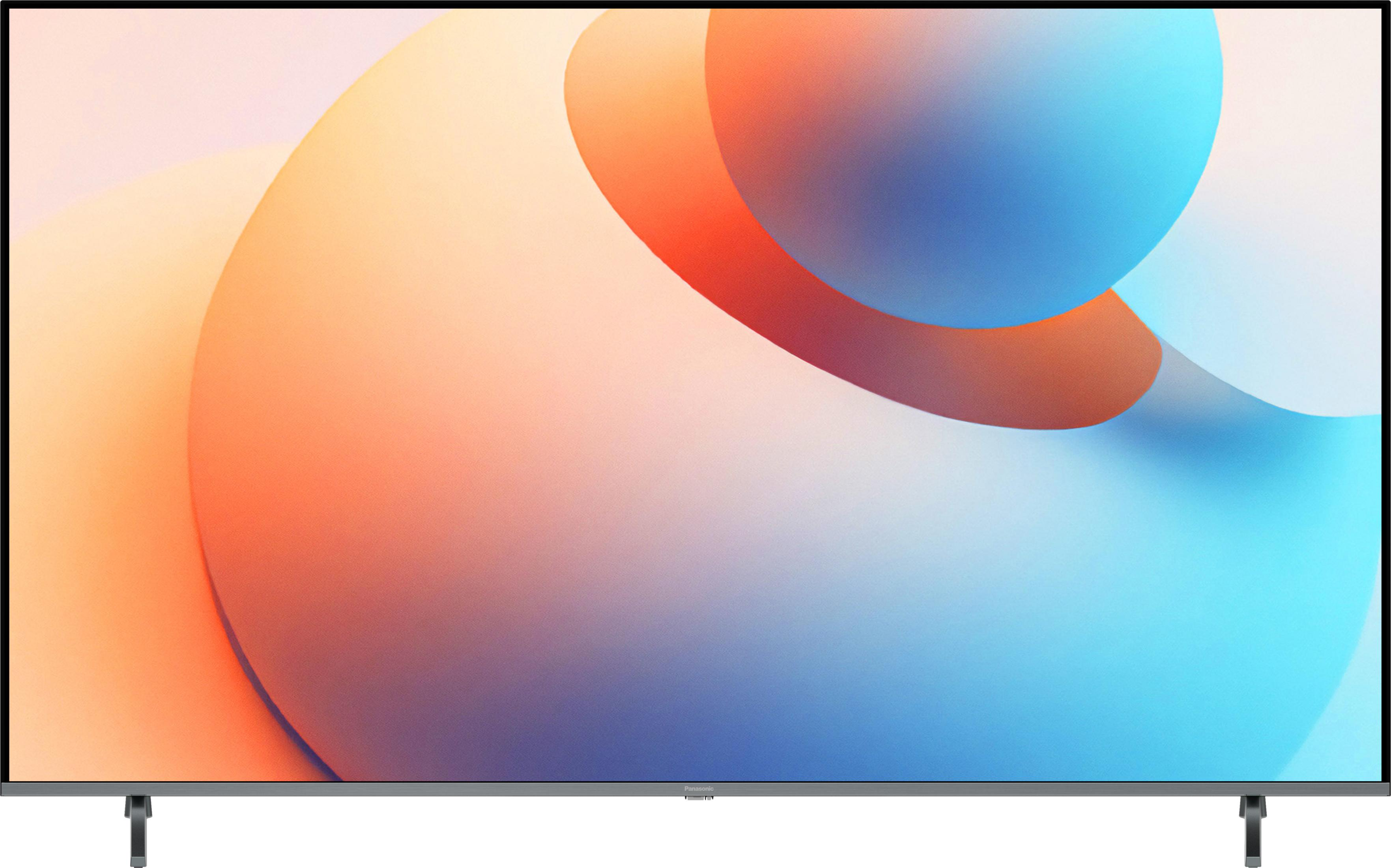 Ein moderner Fernseher mit abstraktem Hintergrund in Orange- und Blautönen.