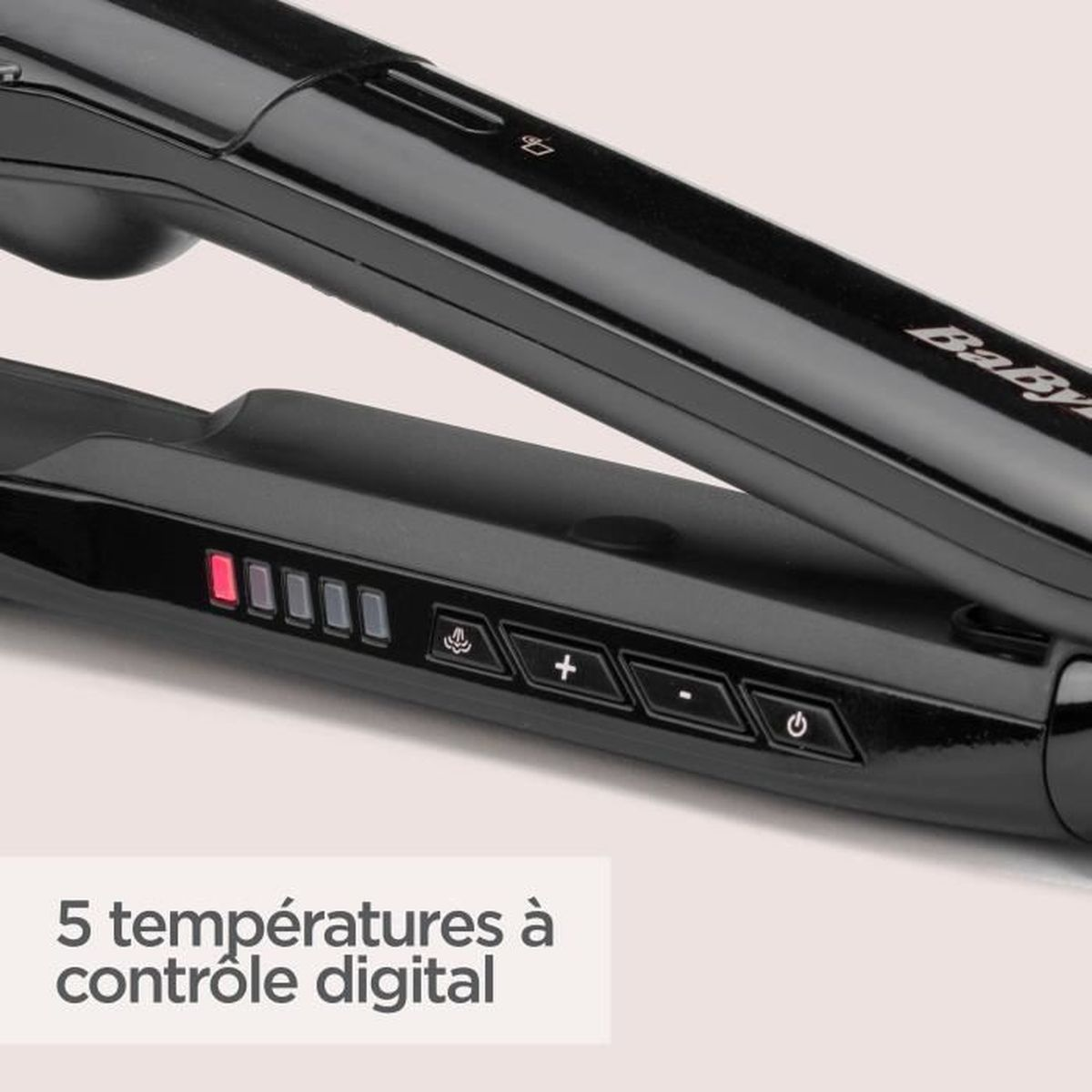 Schwarzer Glätteisen mit digitalen Temperaturreglern und Lichtern.