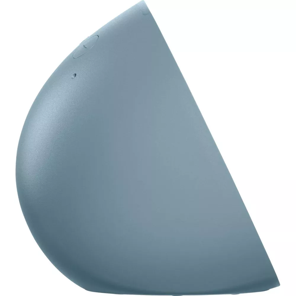Parte blu arrotondata di un oggetto con piccoli fori e scanalature.
