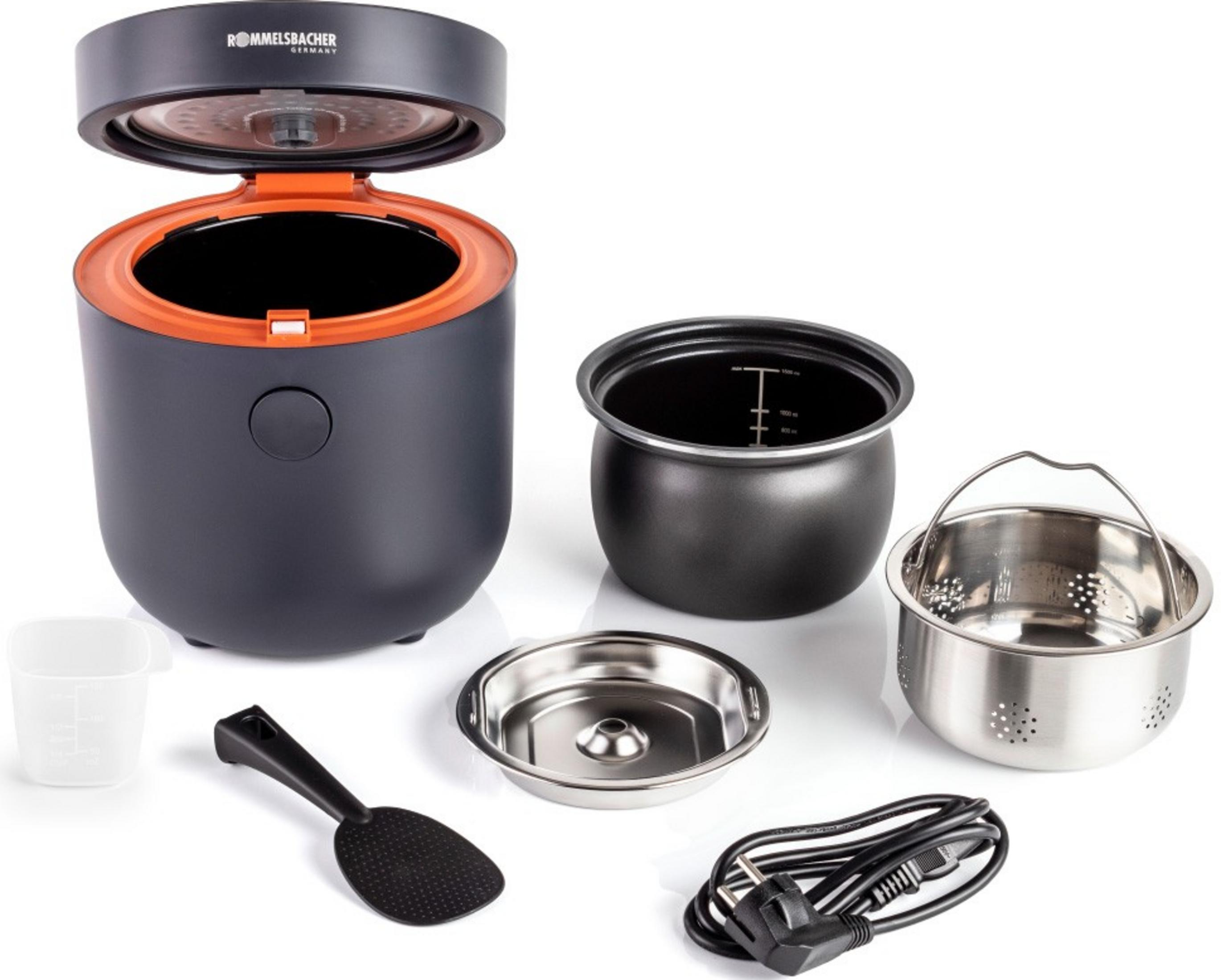 Garnek z otwartą pokrywą, miarka, łopatka do ryżu, koszyk do gotowania na parze i kabel.