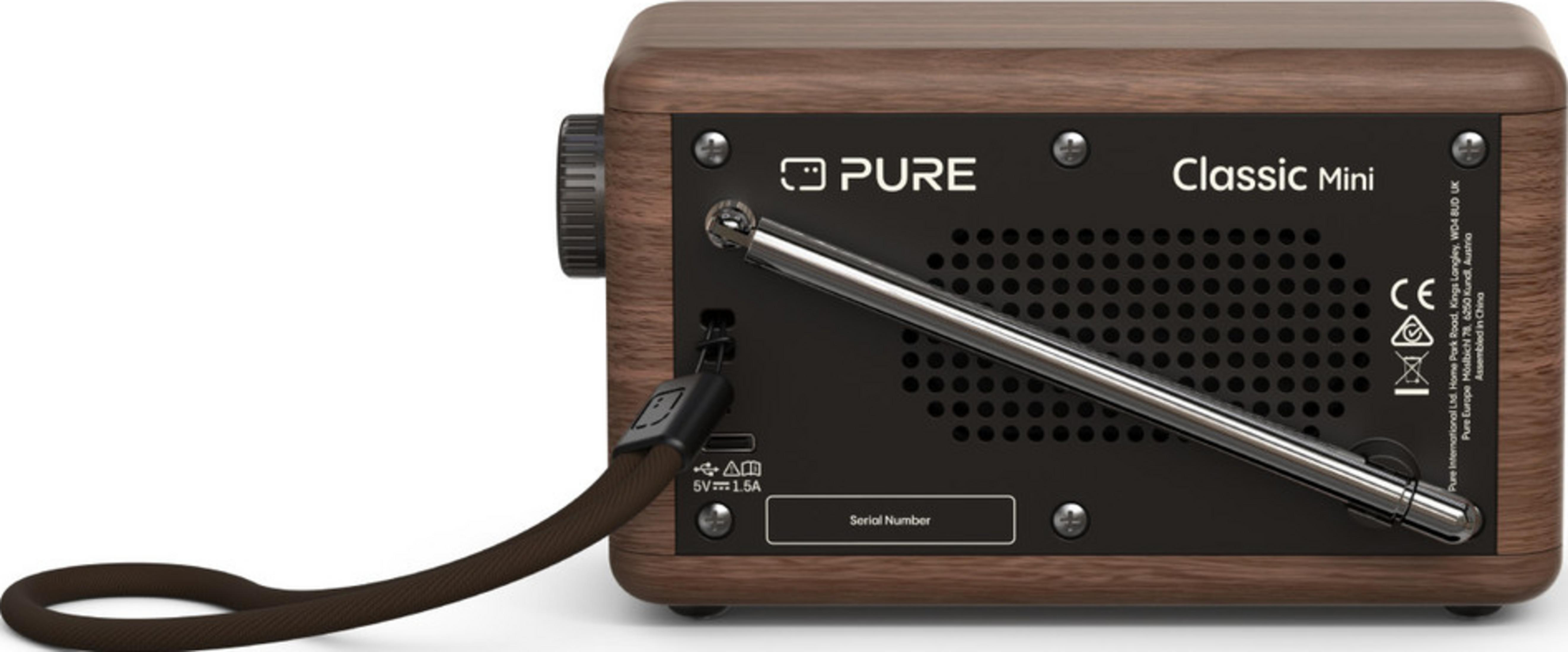Retro di una radio in legno marrone con antenna estraibile e porta USB.
