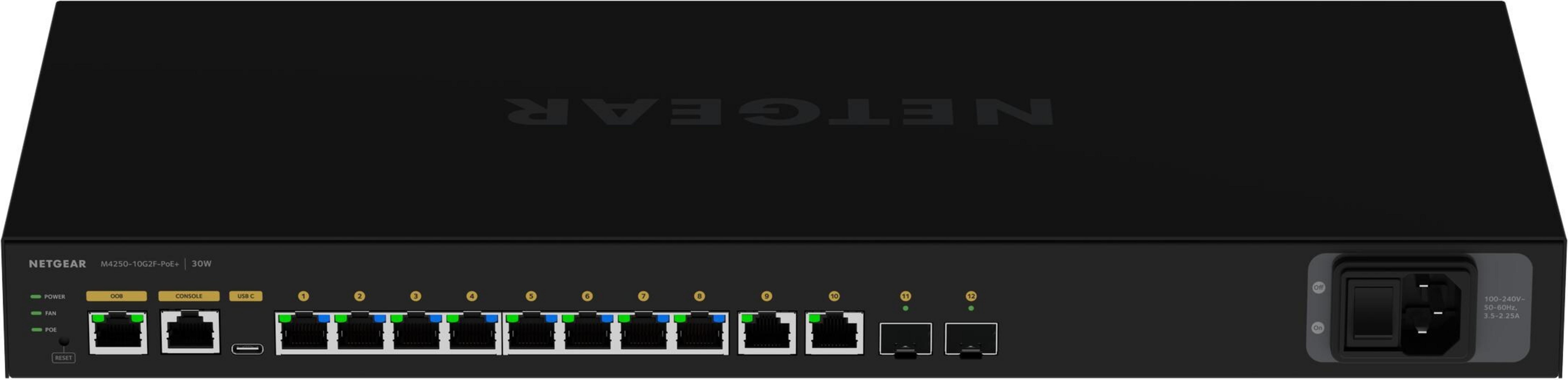 Czarny przełącznik Netgear M4250 z wieloma portami i wskaźnikami LED.