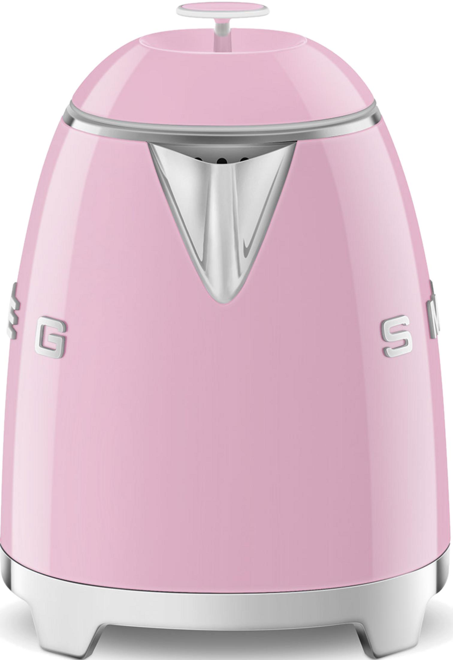 Pasteloworóżowy czajnik z srebrnymi akcentami i uchwytem na pokrywie.