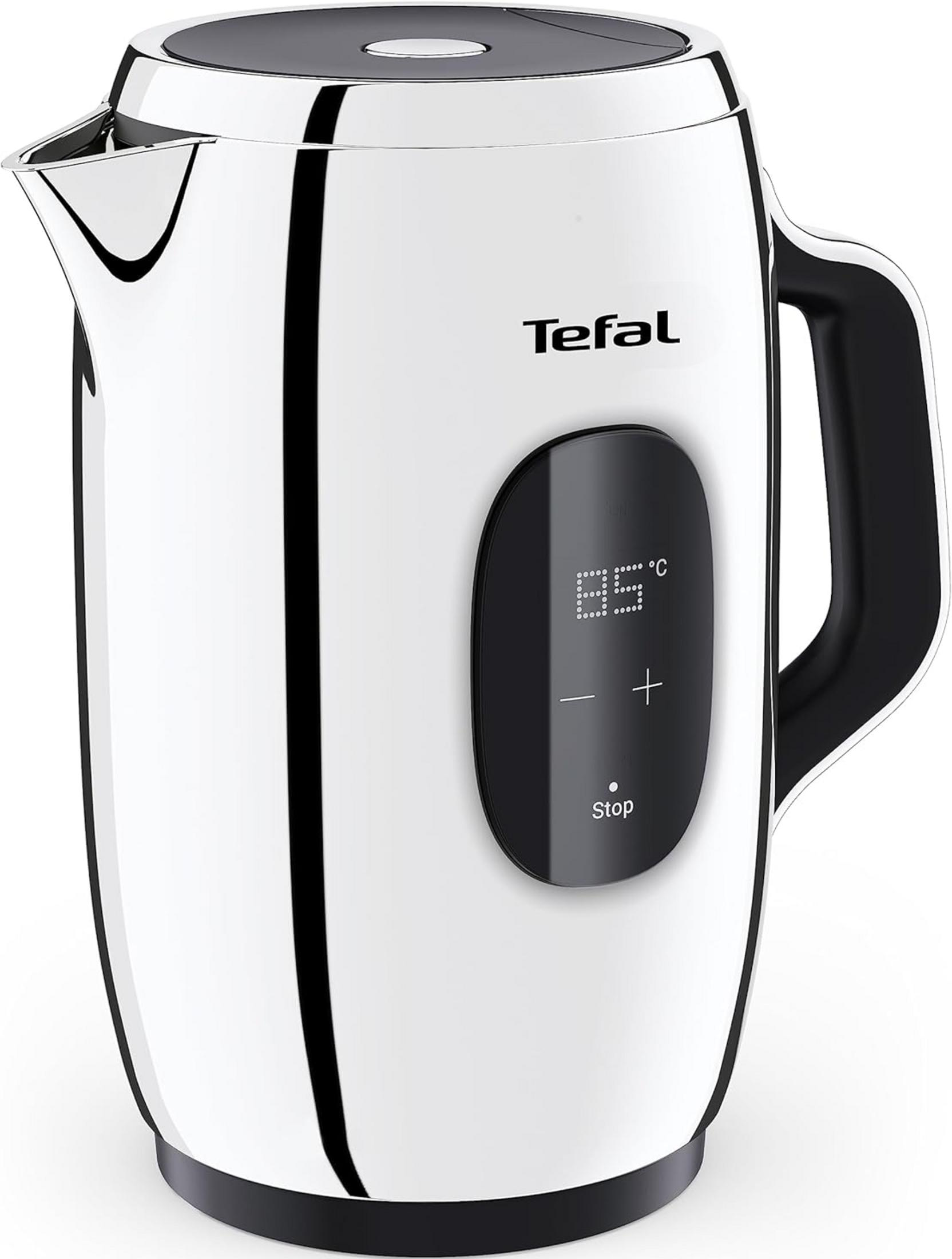 Bollitore bianco moderno con manico nero e display digitale della temperatura.
