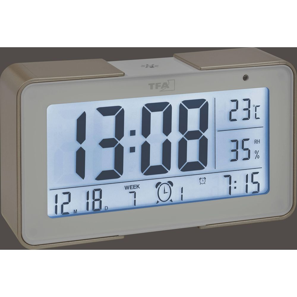 Digitaluhr zeigt 13:08 Uhr, 23°C, 35% RH, Datum 12.18, Tag 7, Wecker 7:15.