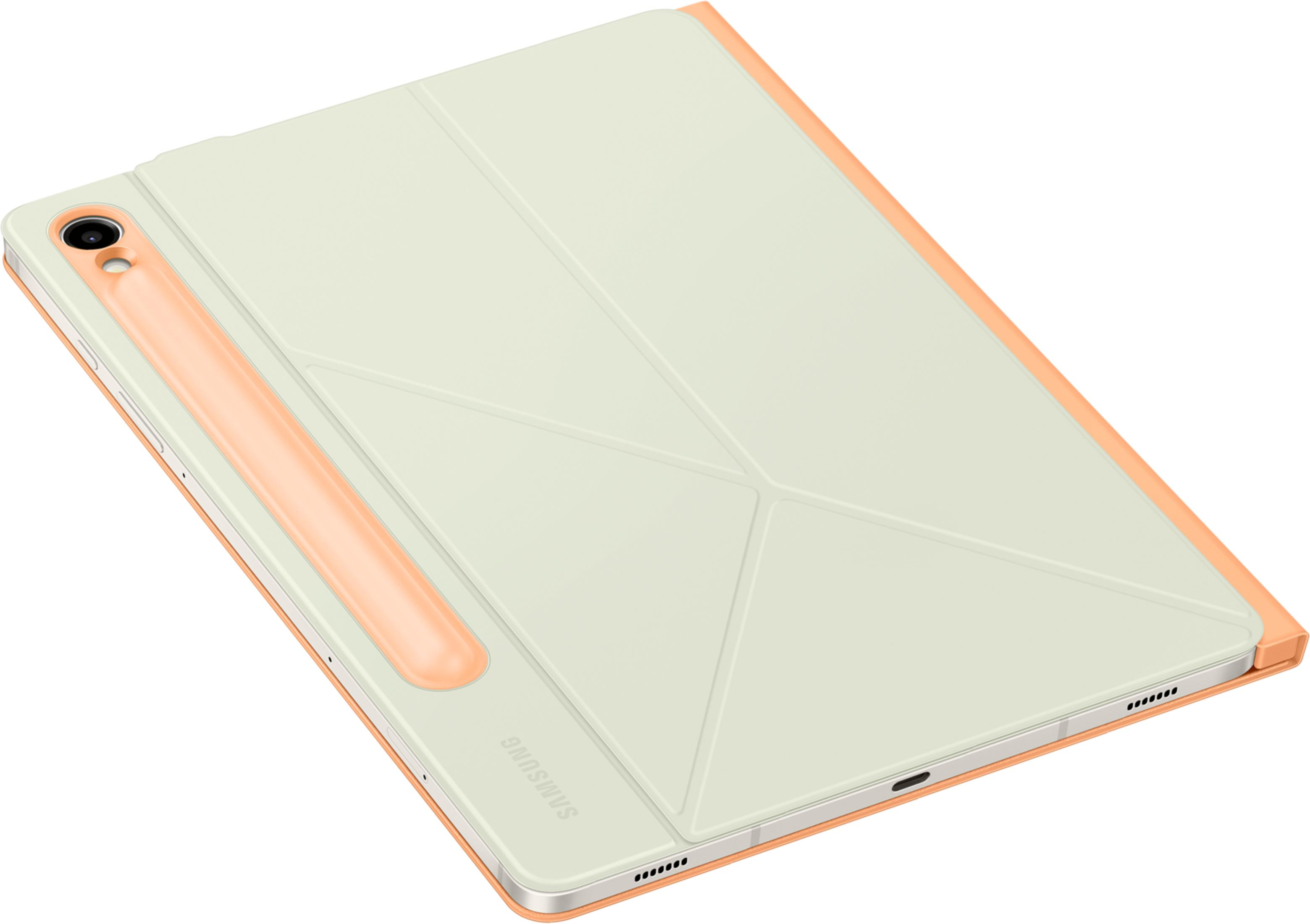 Une tablette vert clair avec un bord corail et un porte-stylo.