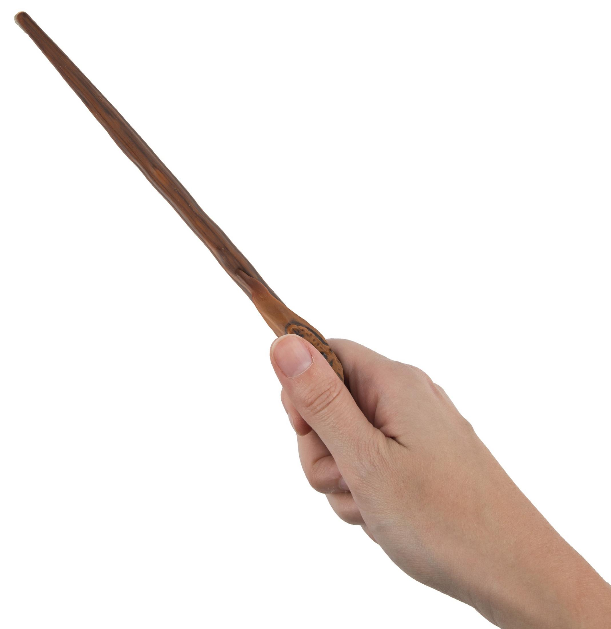 Eine Hand hält einen braunen Zauberstab mit einer geschwungenen Form.
