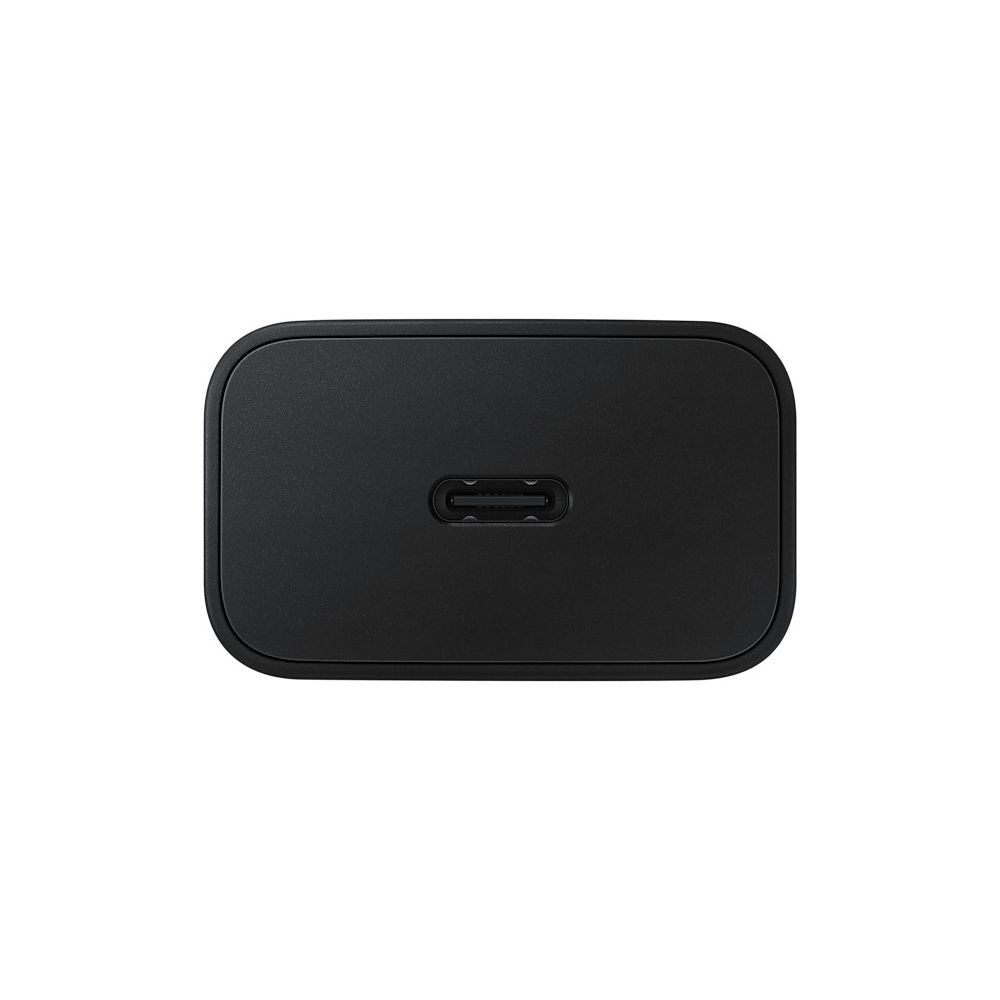 Ein schwarzer USB-C-Ladestecker mit einer ovalen Öffnung in der Mitte.