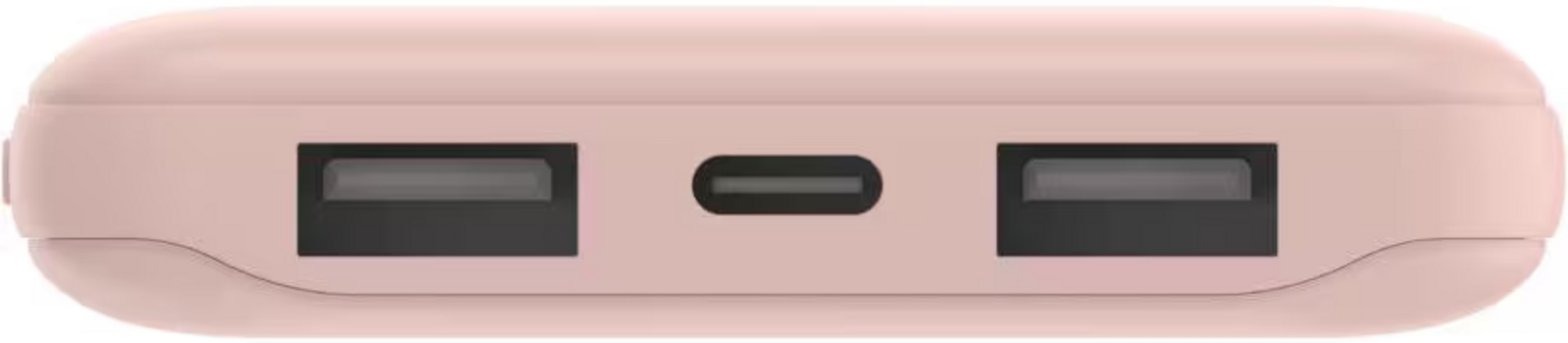 Een roze powerbank met twee USB-A-poorten en één USB-C-poort.