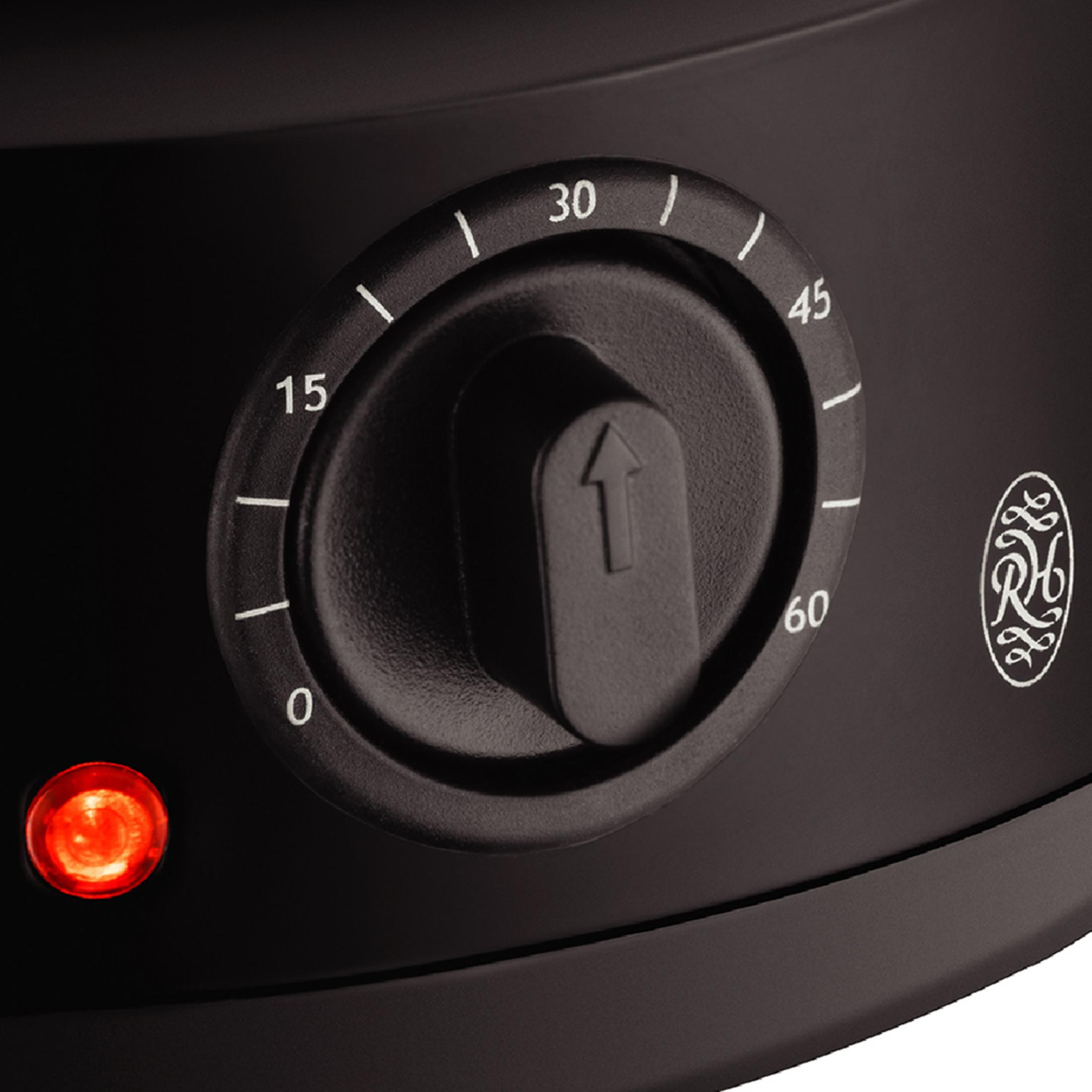 Dial negro con escala de 0-60 y luz indicadora roja.