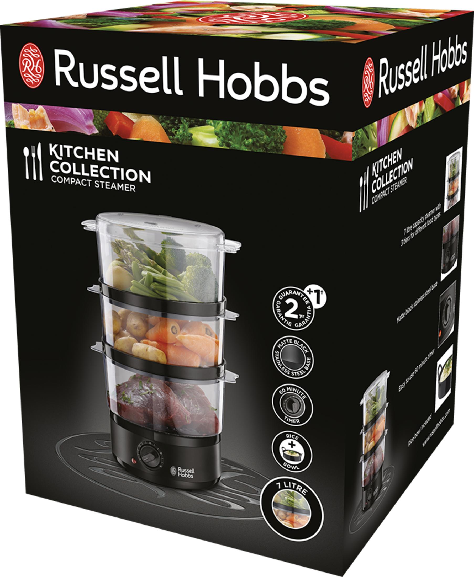 Caja de vaporizador compacto Russell Hobbs con tres niveles lleno de verduras y carne.