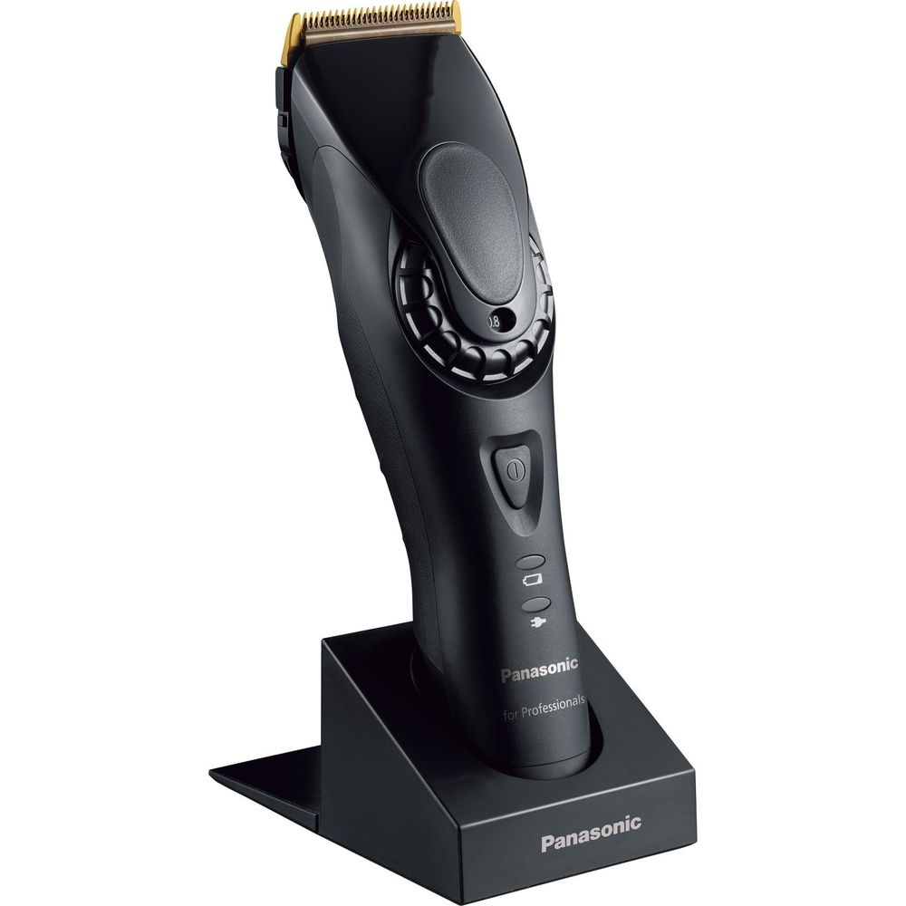 Tondeuse Panasonic noire avec socle de chargement, lames dorées et molette.