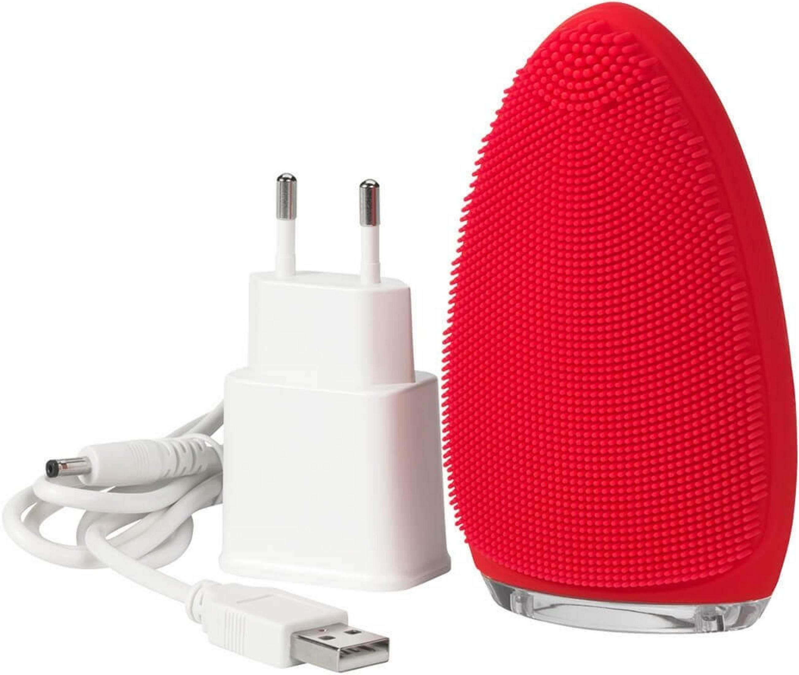 Rote Silikon-Gesichtsreinigungsbürste mit weißem Ladegerät und USB-Kabel.