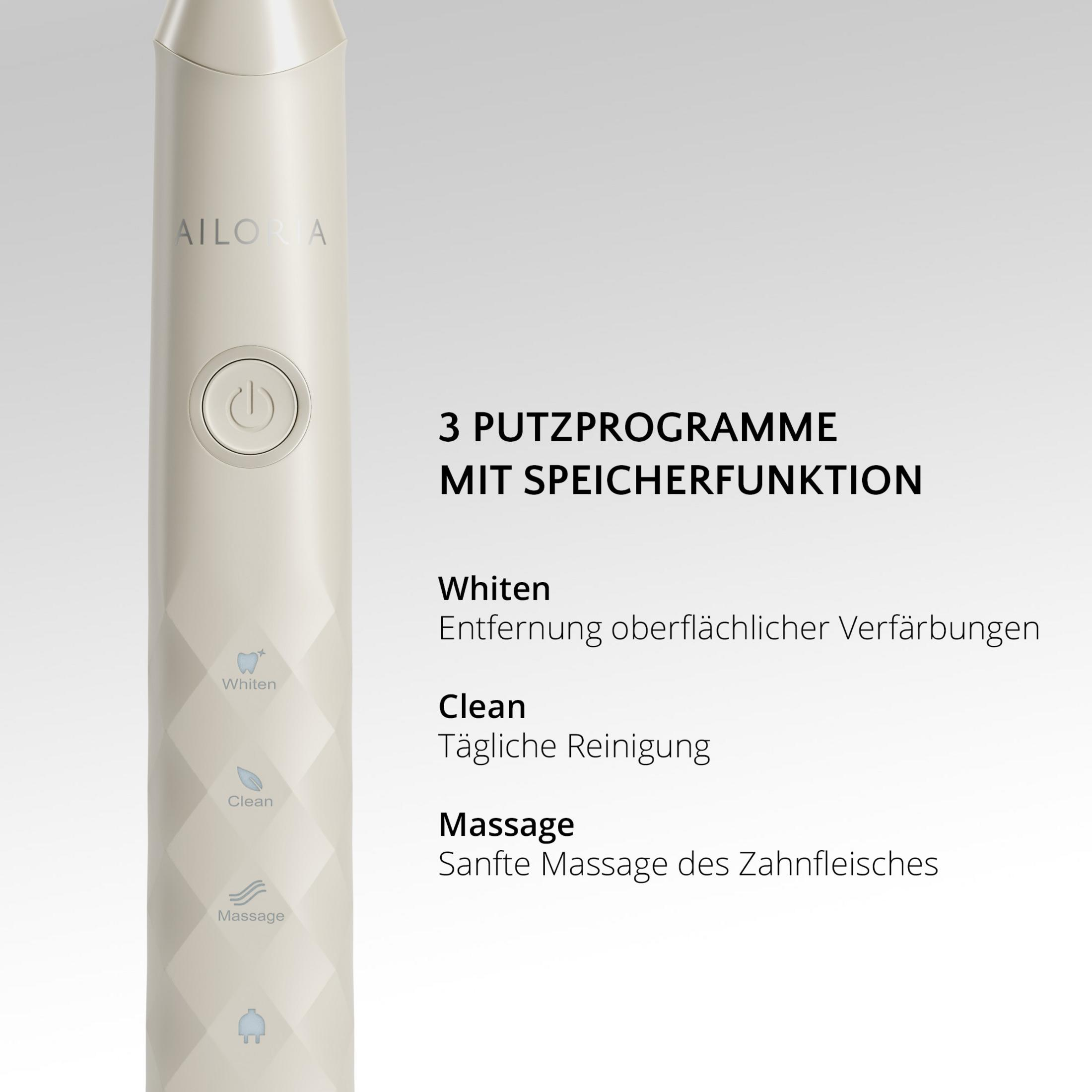 Ein hellbeiger Elektronic Zahnbürste mit drei Putzprogrammen: Whiten, Clean und Massage.
