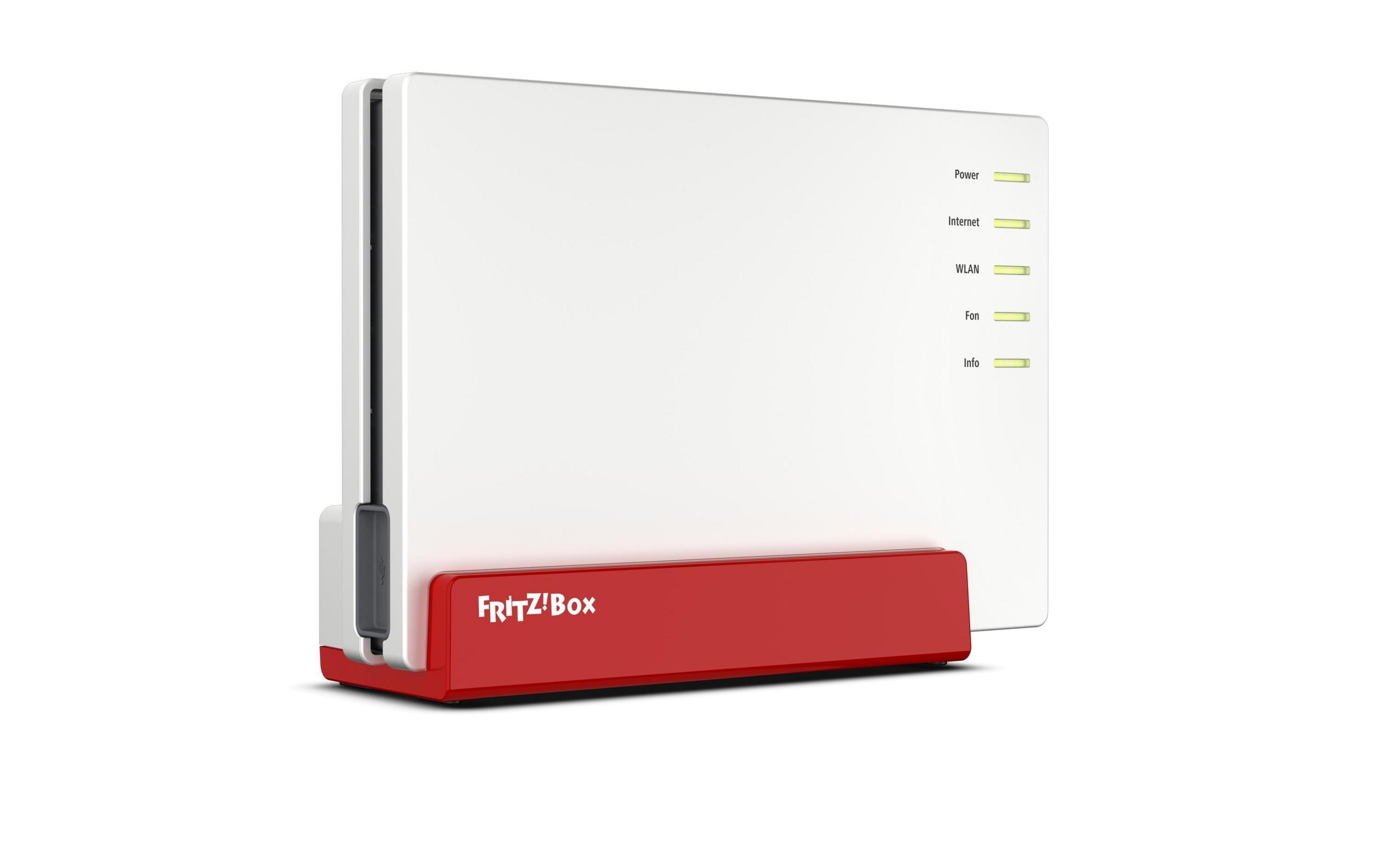 Un router Fritz!Box bianco con base rossa e luci indicatori accese.