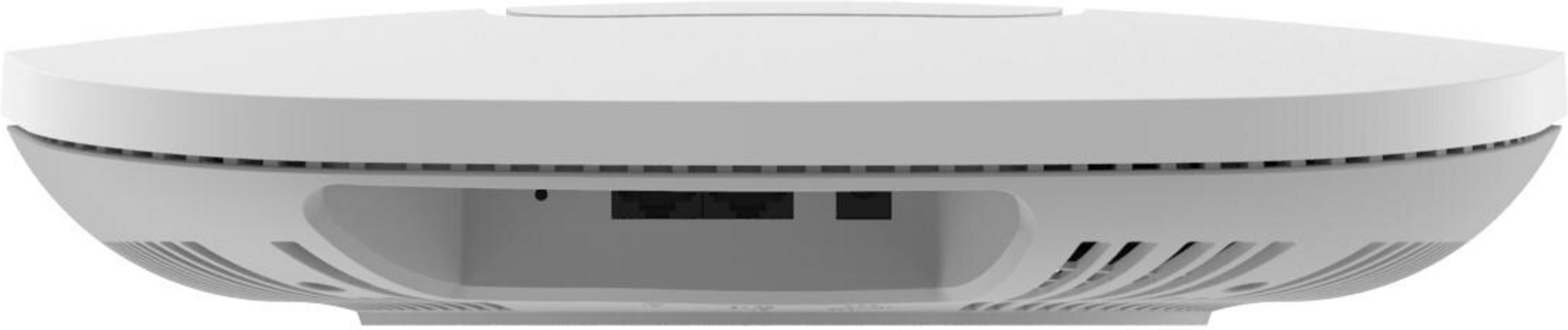 Białe, okrągłe urządzenie z otworami wentylacyjnymi i portami.