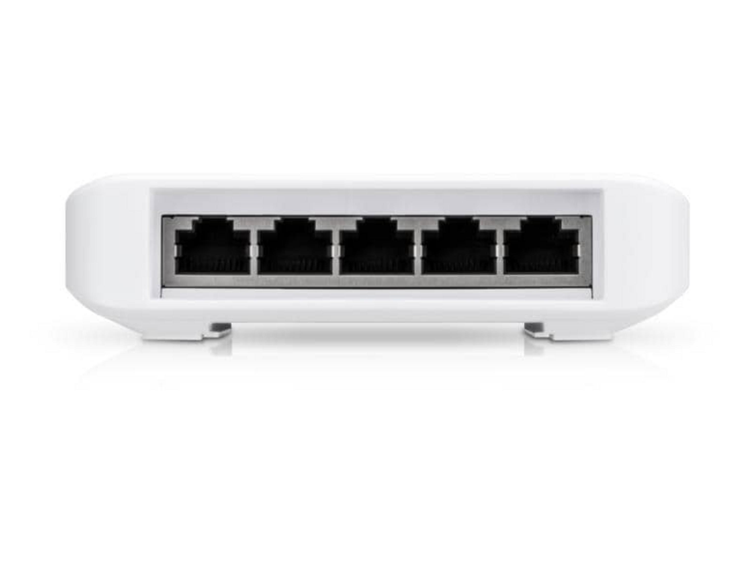 Un commutateur réseau blanc avec cinq ports Ethernet.