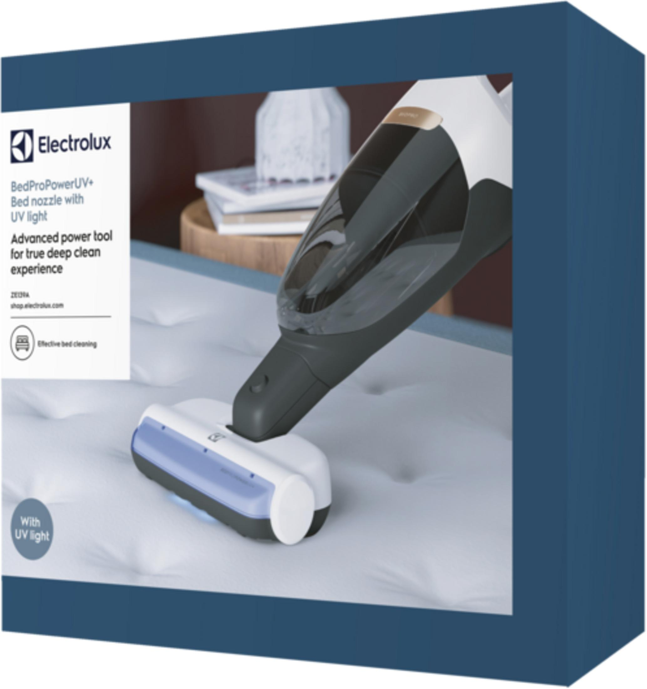 Buse de lit Electrolux avec lumière UV sur un matelas.