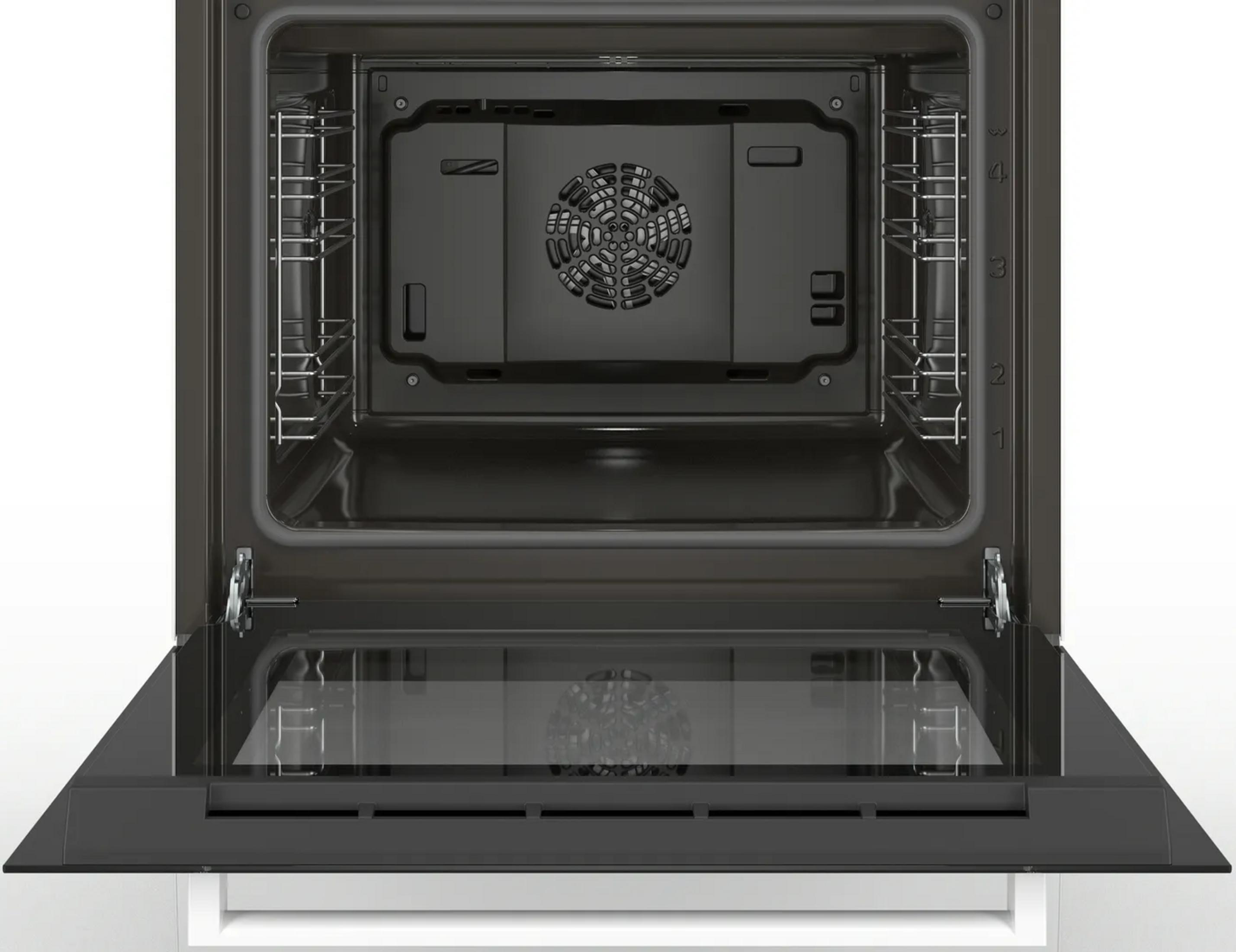 Un forno aperto e vuoto con griglie metalliche e ventola sul retro.