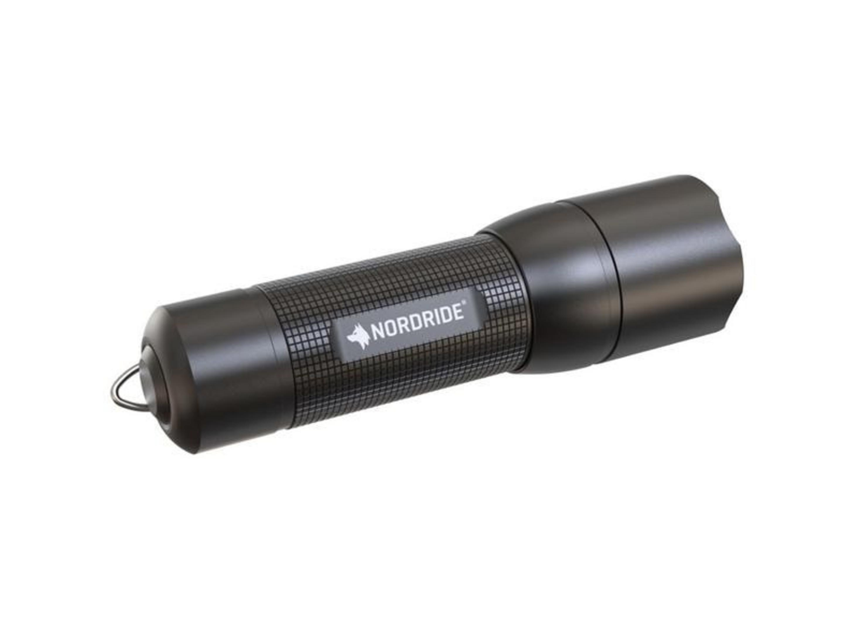 Une lampe de poche noire avec une poignée texturée et le logo NORD RIDE.