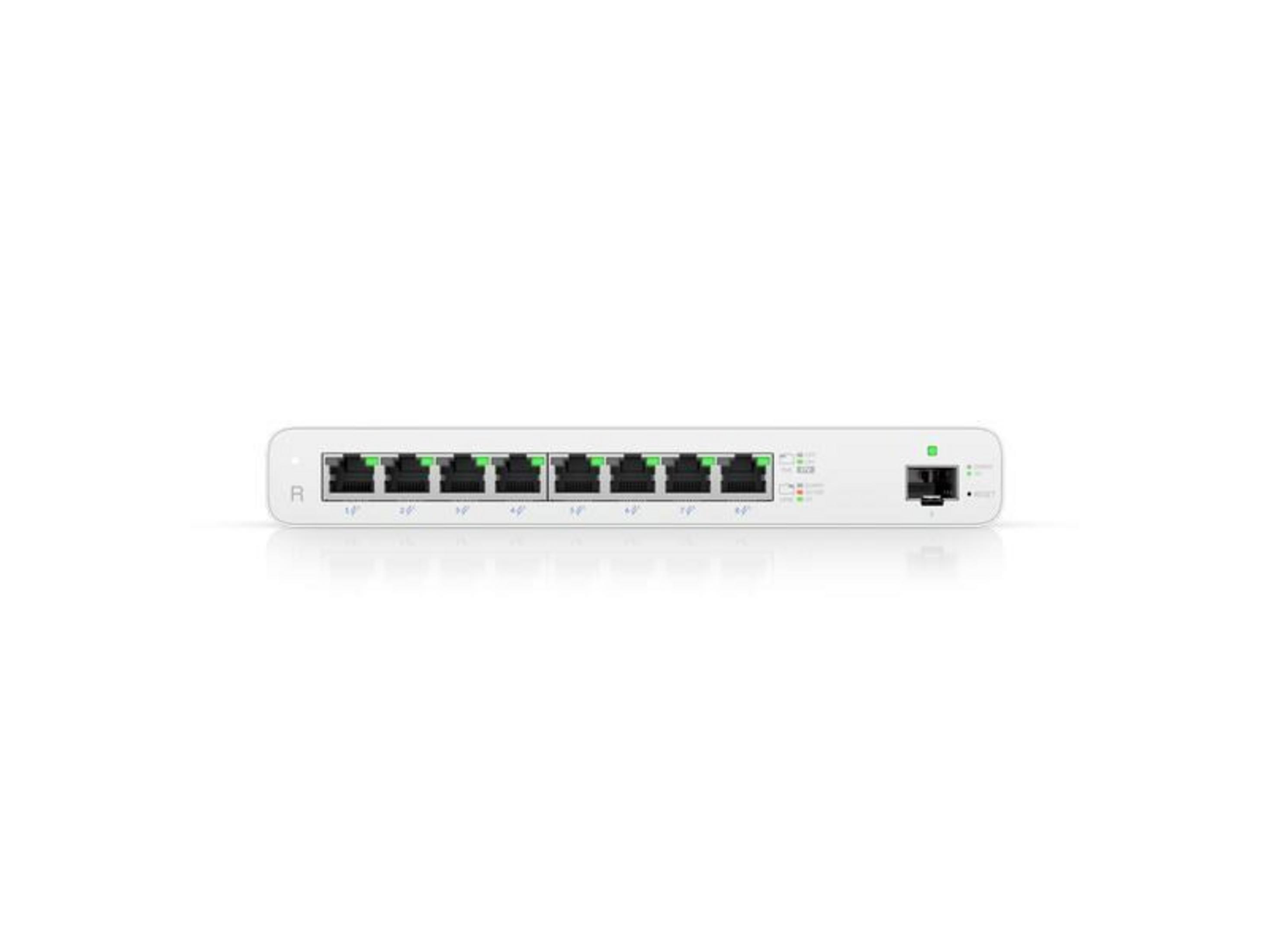 Uno switch di rete bianco con otto porte e luci indicatrici verdi.