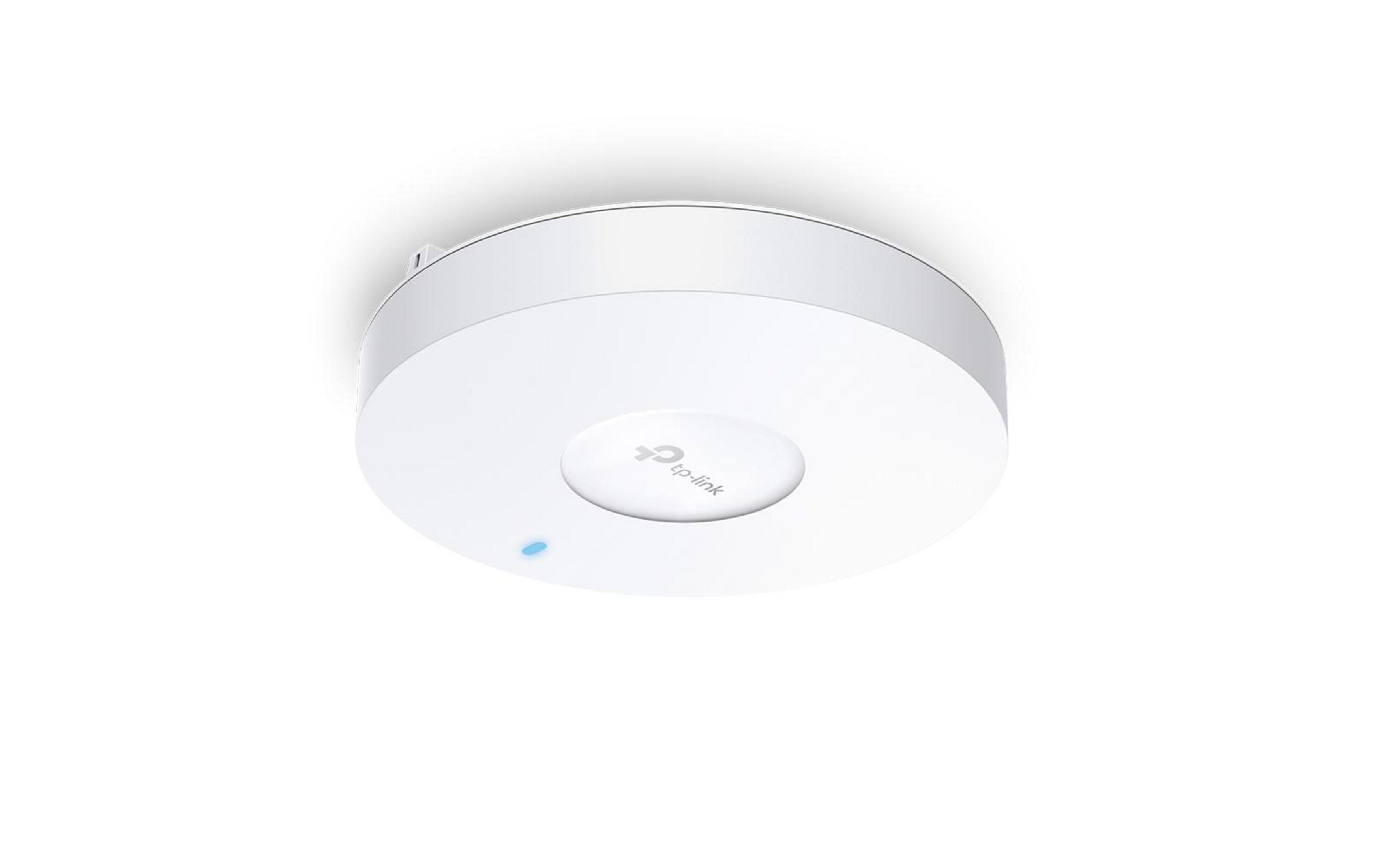 Un point d'accès TP-Link blanc et rond avec une lumière bleue sur fond blanc.