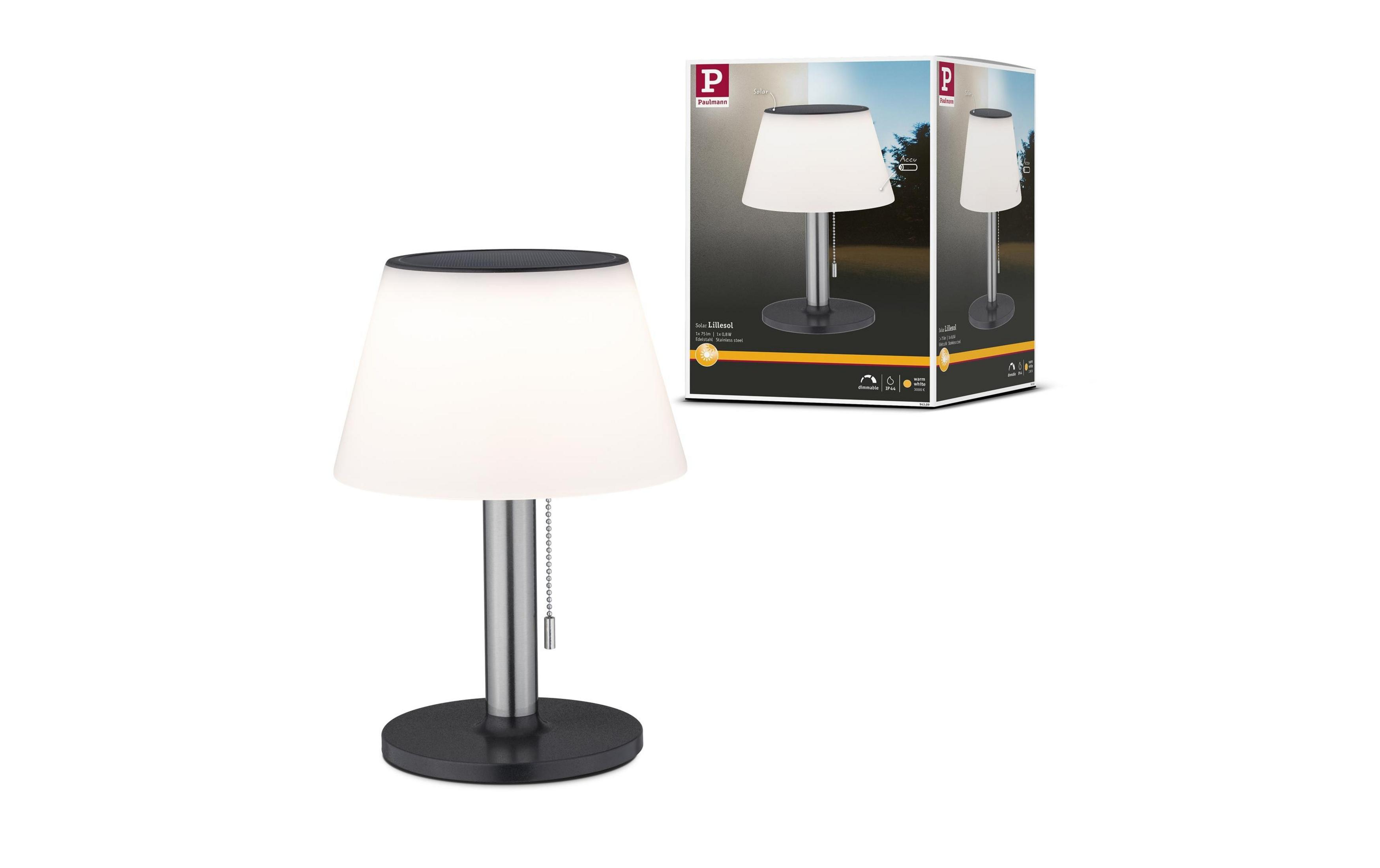 Lampa stołowa solarna z białym kloszem i metalową podstawą. Obok opakowanie.