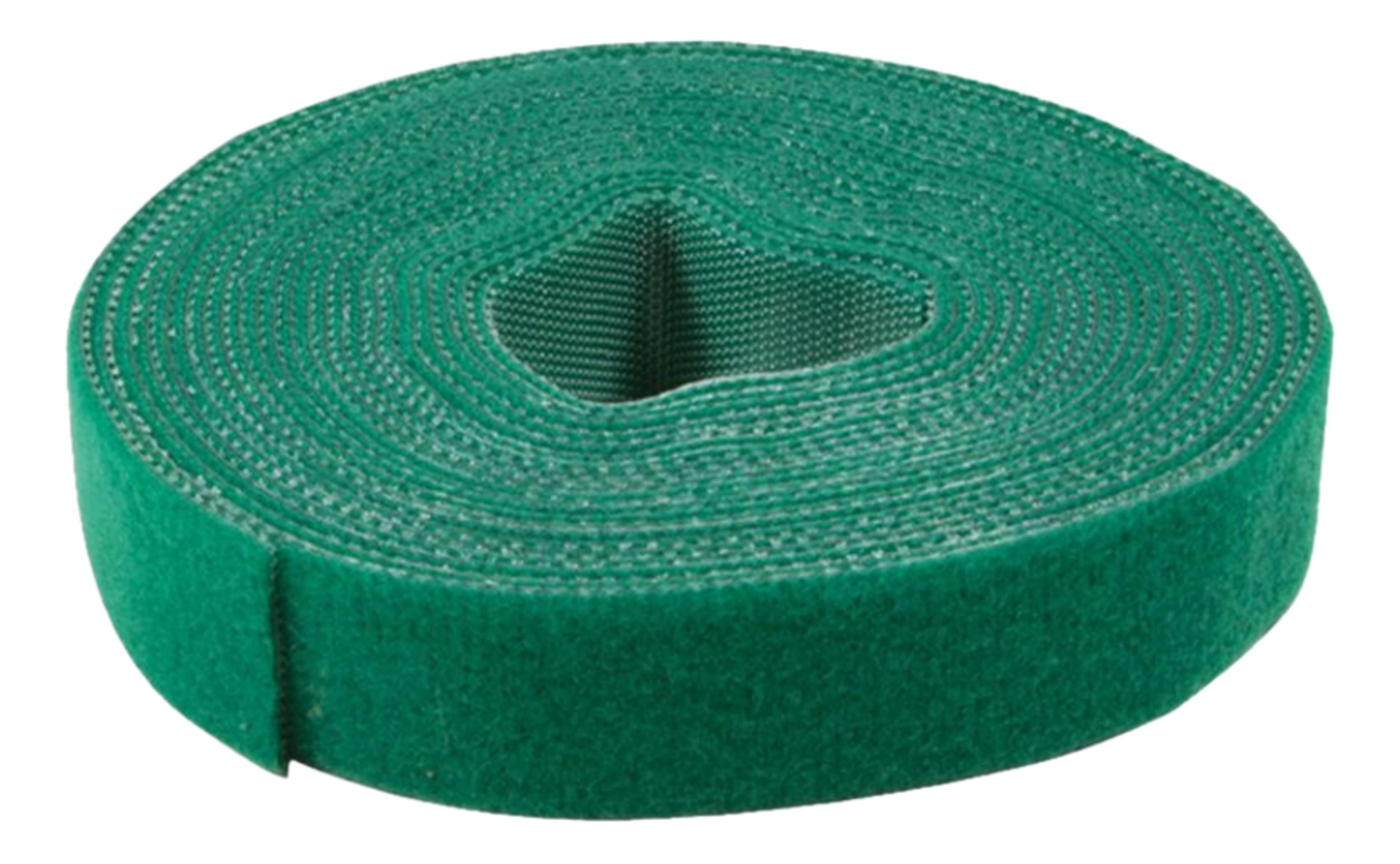 Een rol groene klittenband met een gat in het midden.