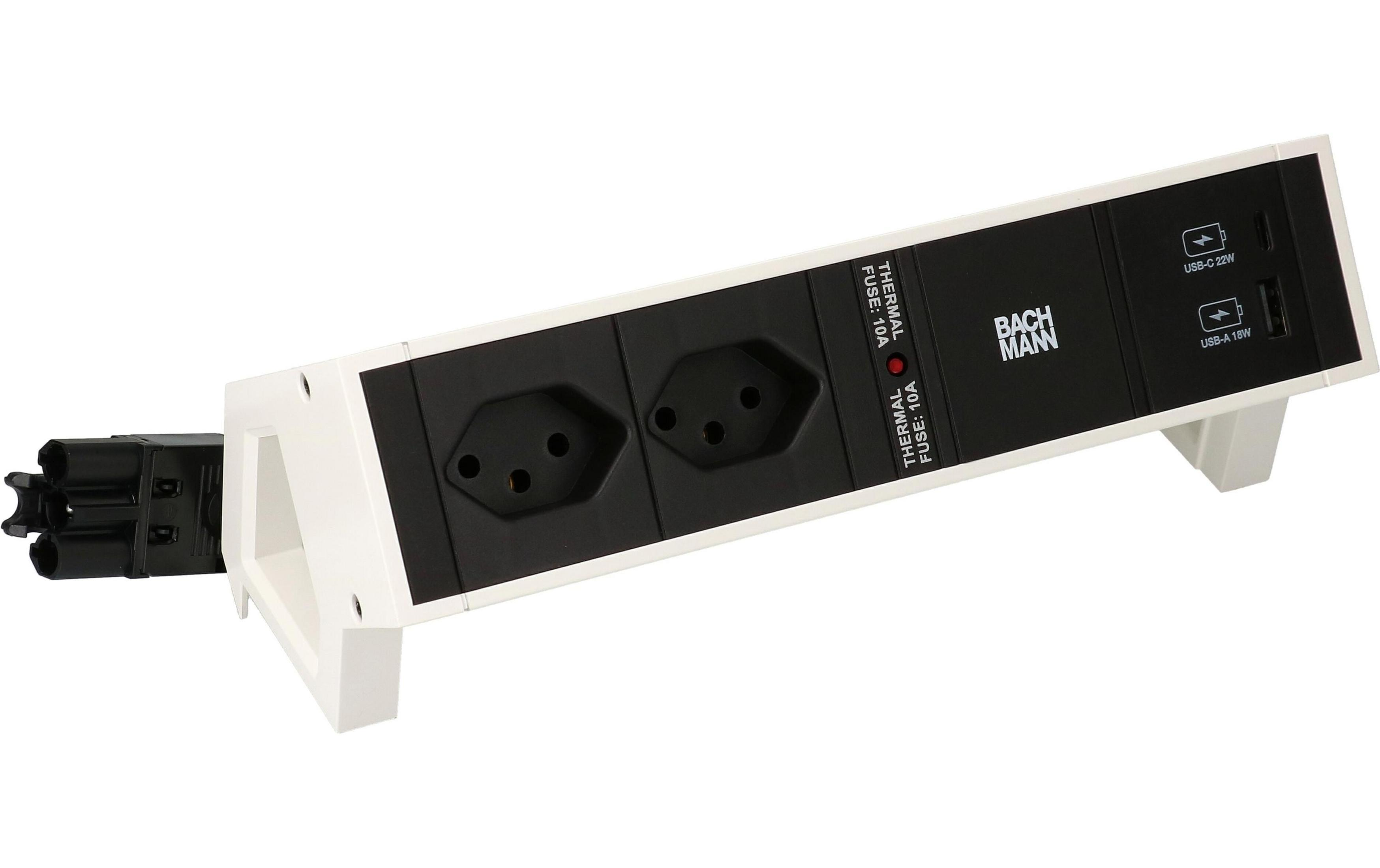 Een witte stekkerdoos met twee stopcontacten, USB-C en USB-A poorten.