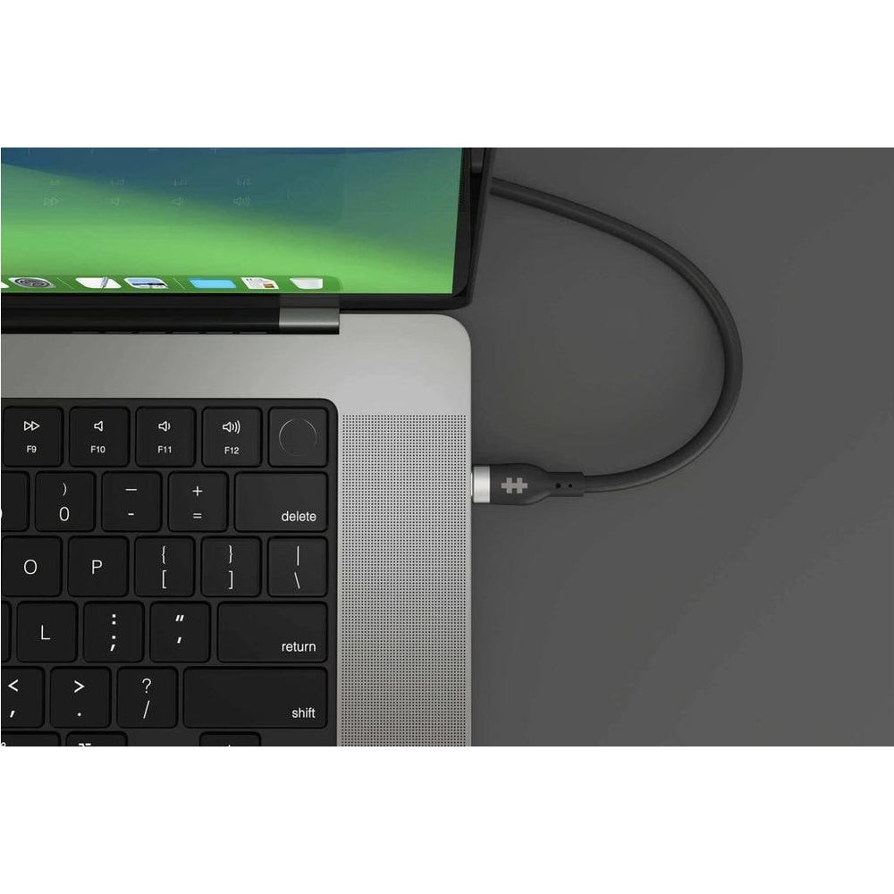 Un cavo nero con connettore a croce è collegato a un laptop.