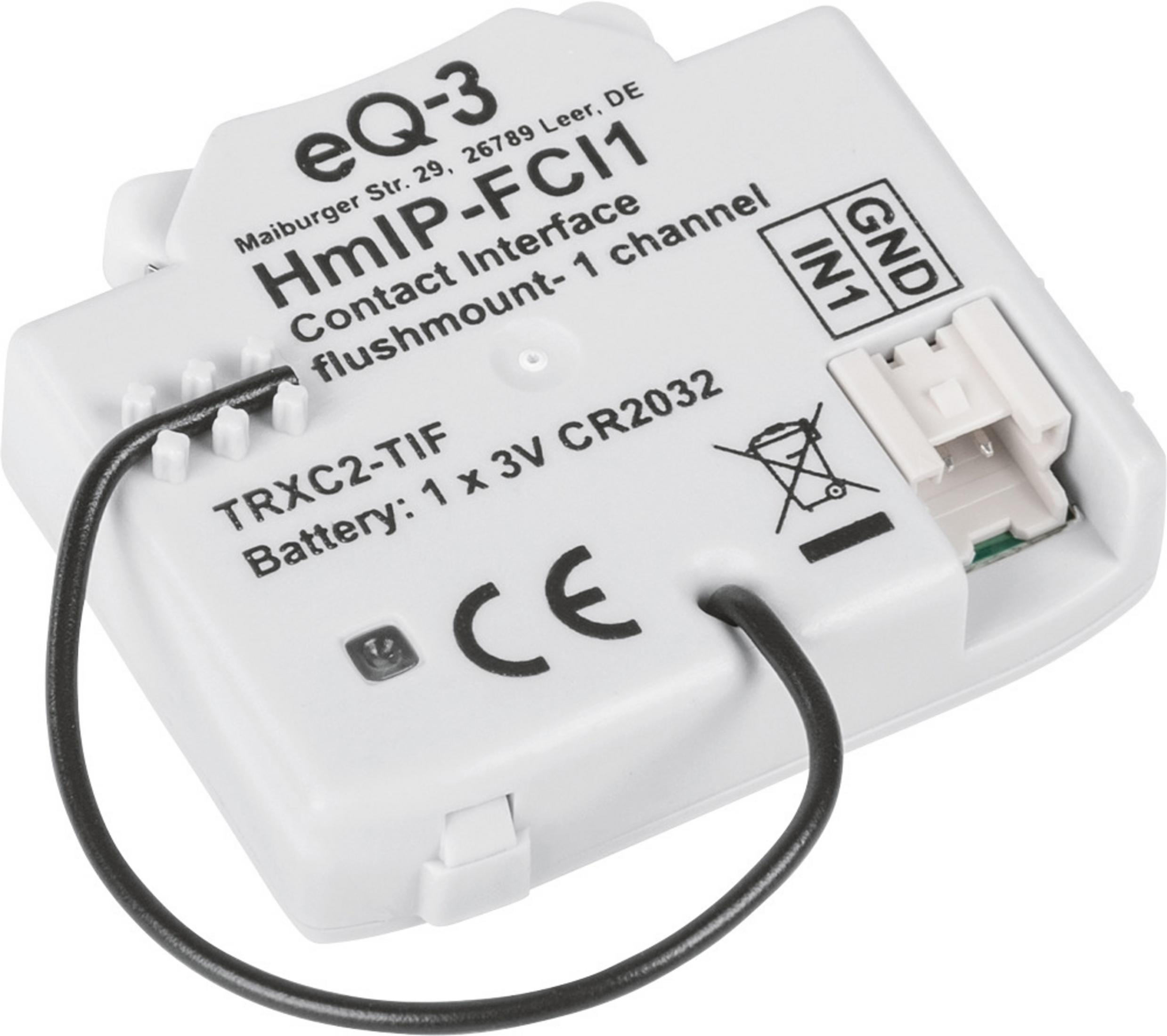 Ein weißes eQ-3 HmIP-FC11 Kontaktinterface mit Kabel und Beschriftung.