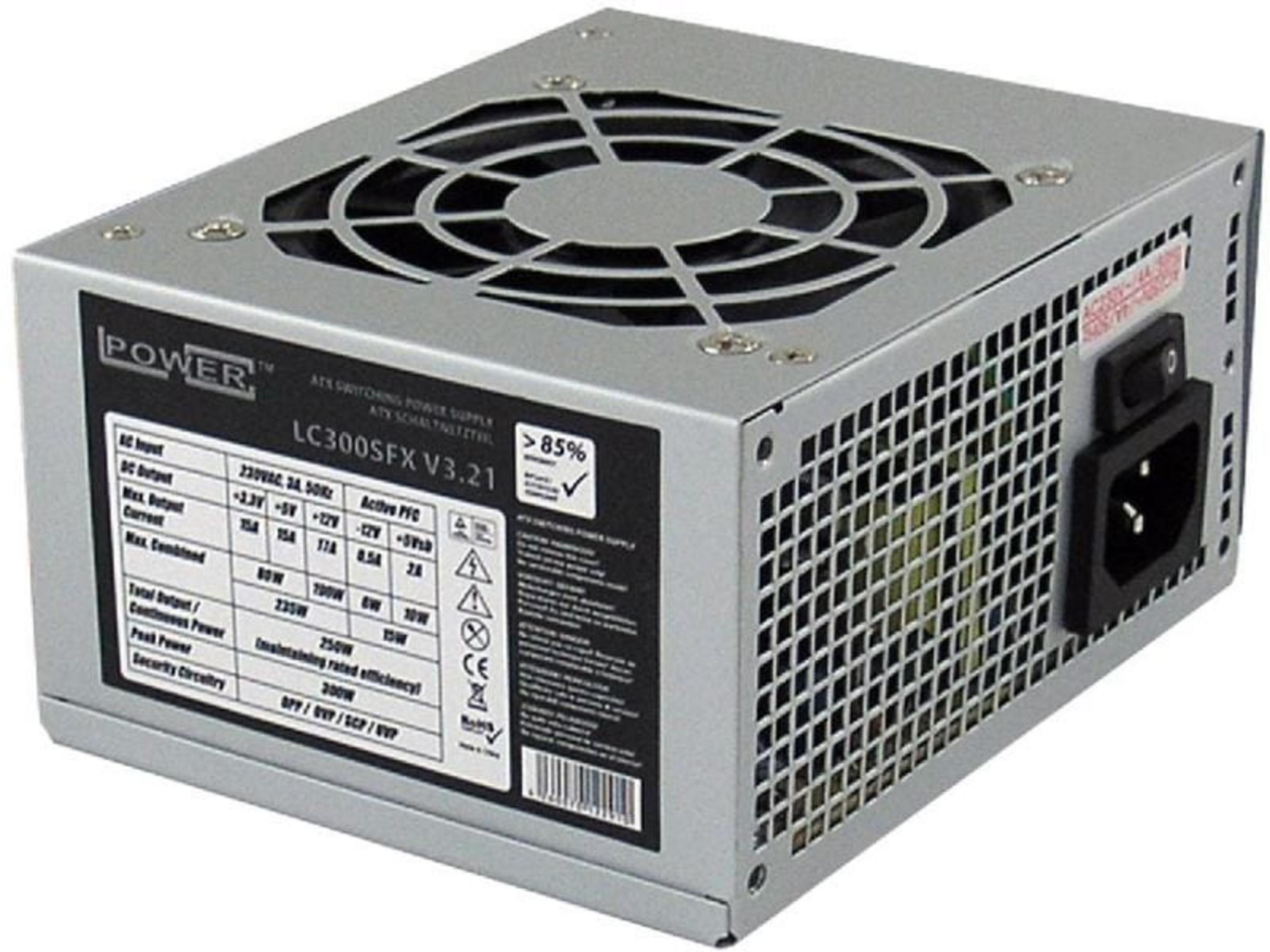 Un alimentatore argentato per PC con griglia della ventola e etichetta.