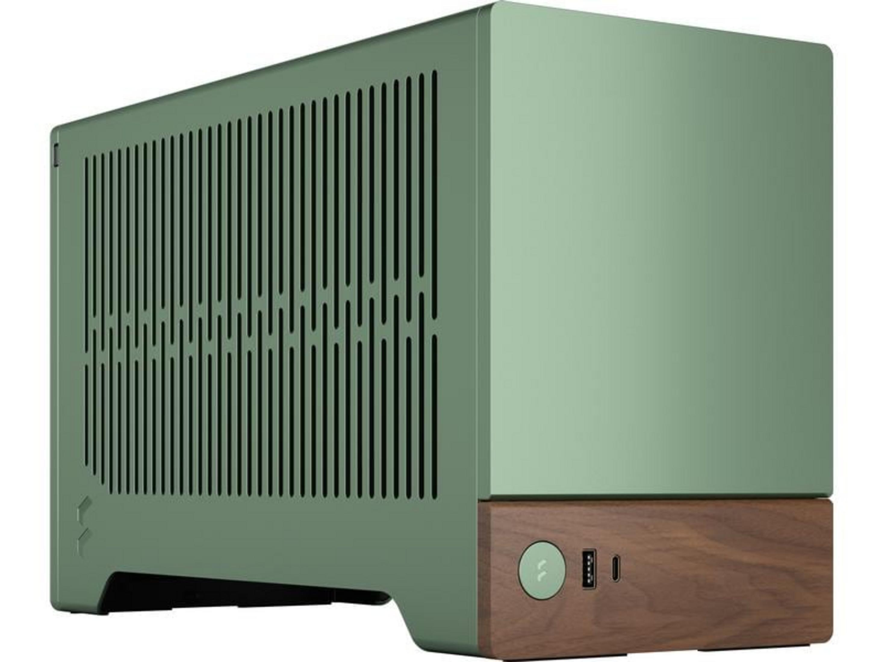 Una caja de computadora pequeña y verde con base de madera y puertos.